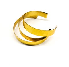 A gilded metal 'ribbon' cuff, Herve Van Der Straeten, France, 1990s