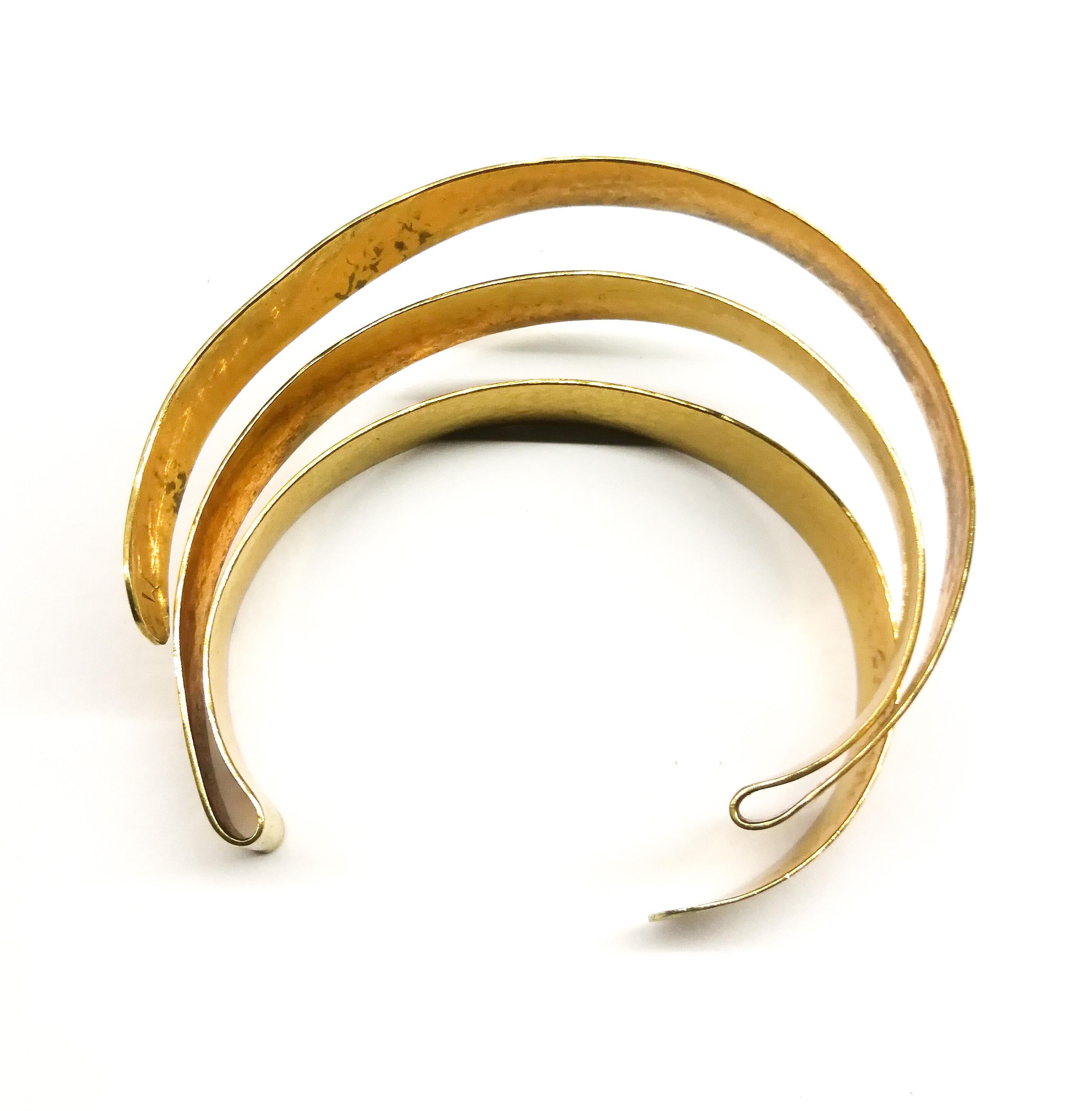 A gilded metal 'ribbon' cuff, Herve Van Der Straeten, France, 1990s In Good Condition In Greyabbey, County Down