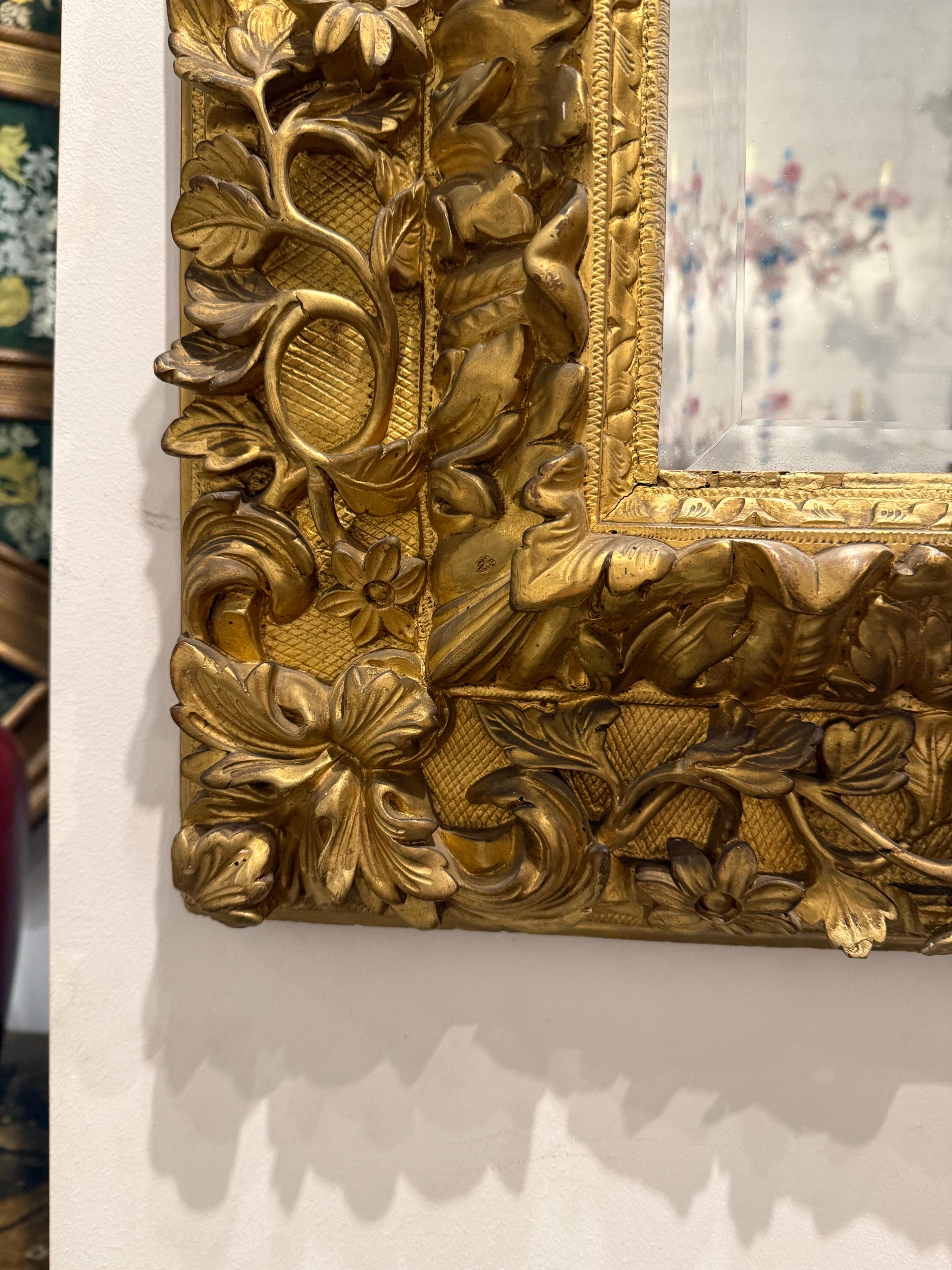 Bois A Gilded Mirror with Three Cherubs, 19th Century en vente