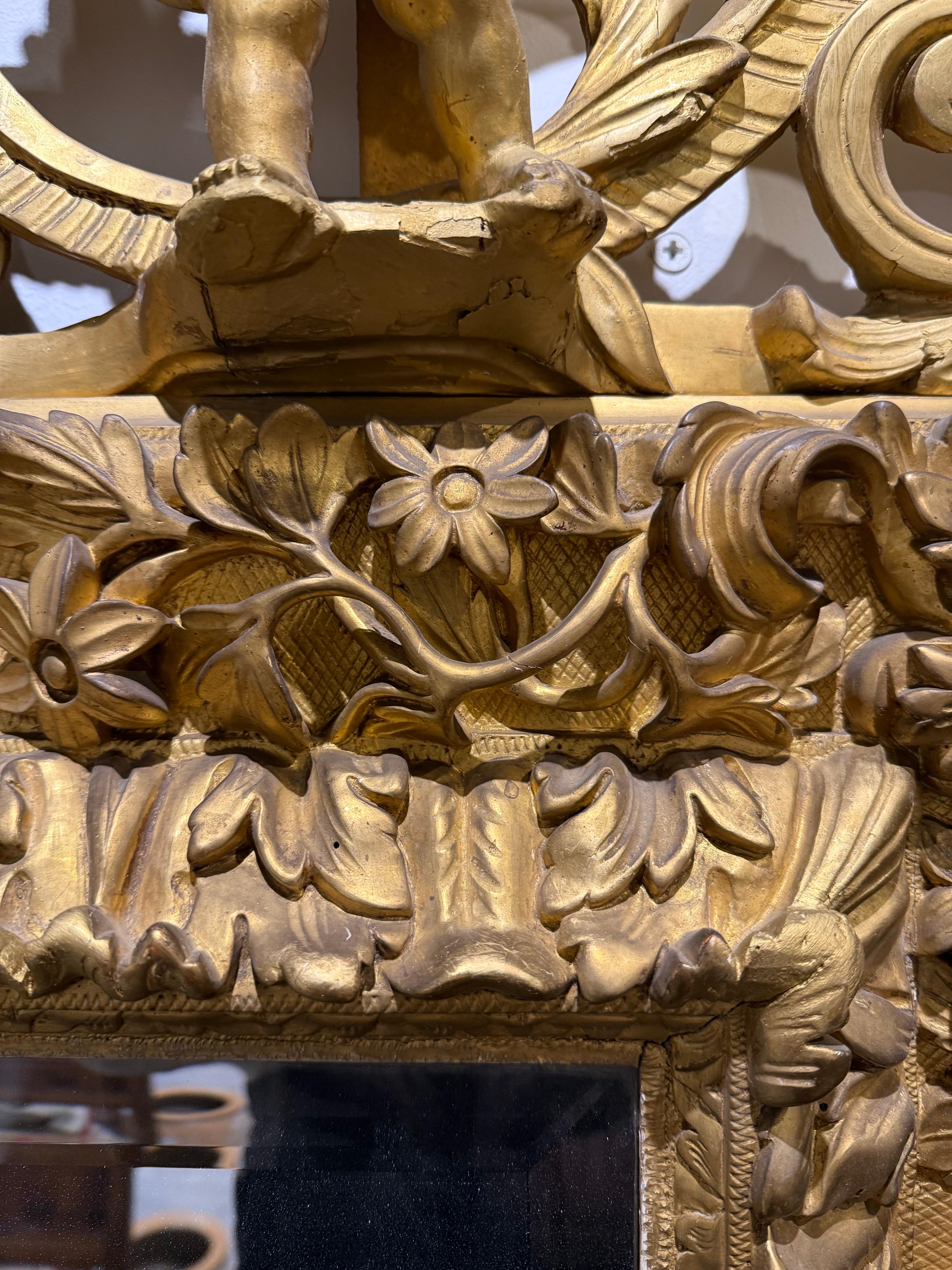A Gilded Mirror with Three Cherubs, 19th Century en vente 1