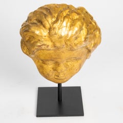 A Gilded Wooden Sculpture Of a Cherub’s Head From The 17th Or 18th Century.