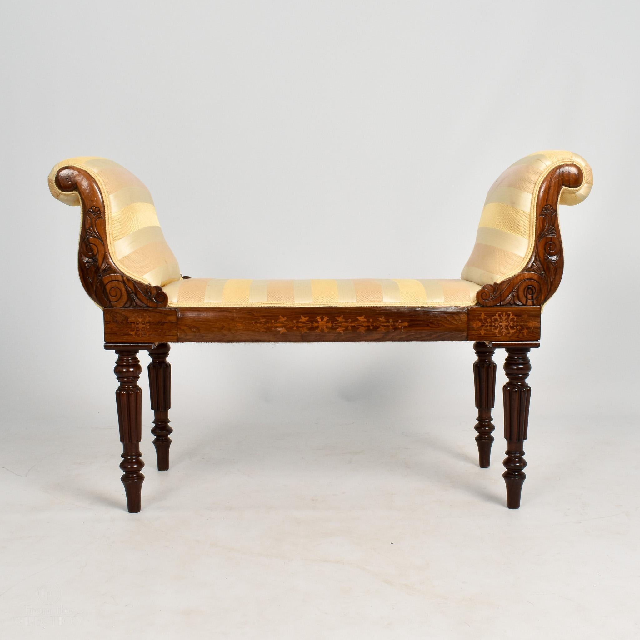 A Gillows Mahogany Window Seat circa 1840. With delicately carved detail above the turned legs and scroll ended arms. In excellent condition and beautiful colour. A rare example of Gillows furniture. 