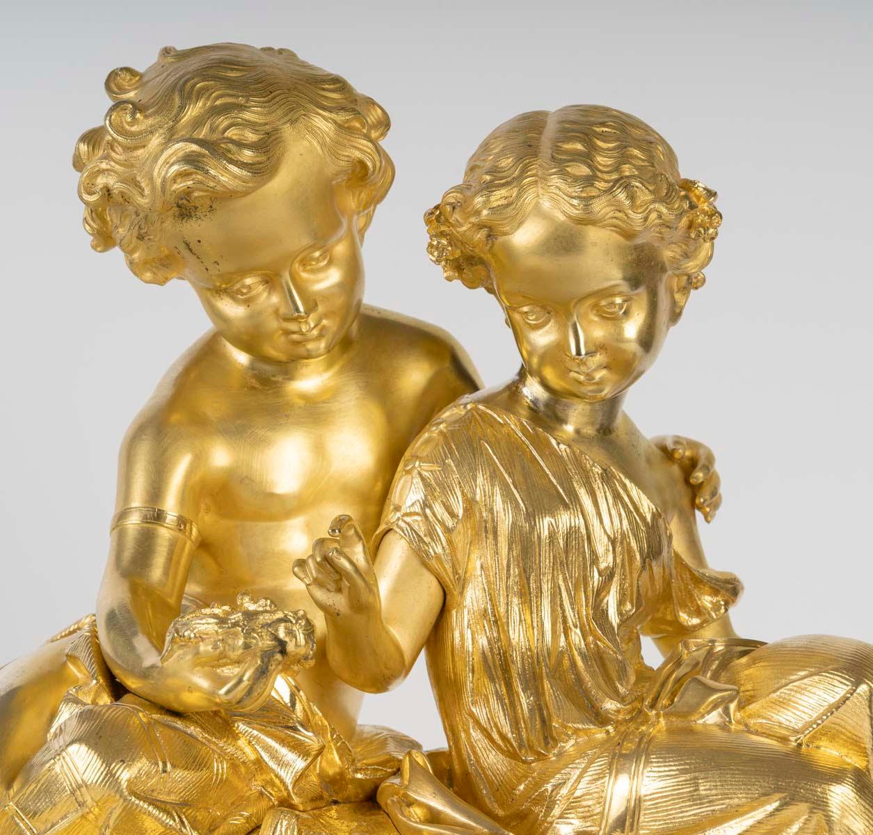 A Gilt and Chased Bronze Clock, a Marble Base, Napoleon III Period, 19th Century In Good Condition In Saint-Ouen, FR