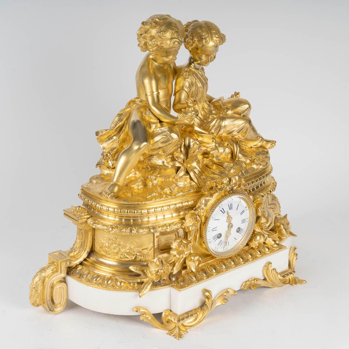 A Gilt and Chased Bronze Clock, a Marble Base, Napoleon III Period, 19th Century 2