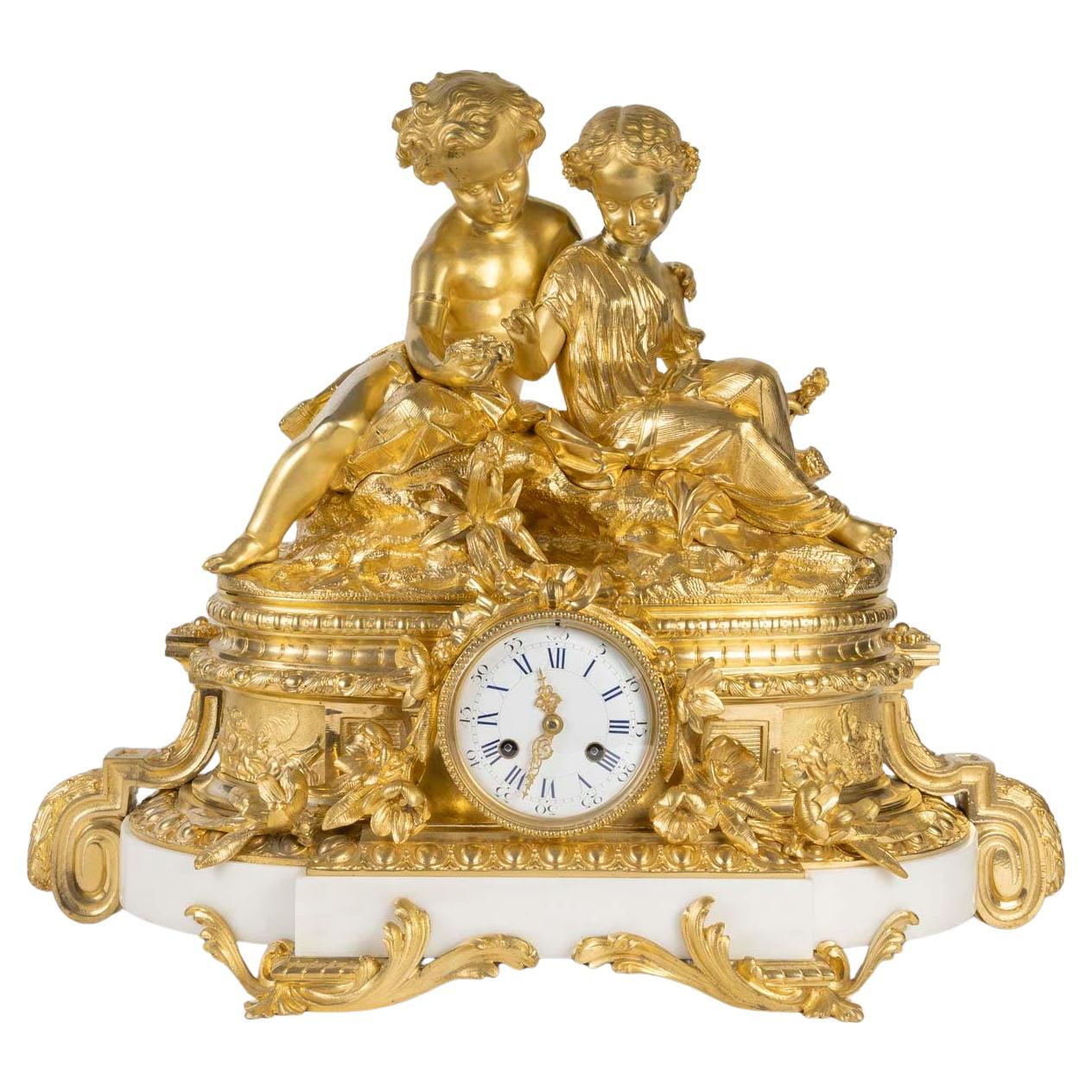 A Gilt and Chased Bronze Clock, a Marble Base, Napoleon III Period, 19th Century