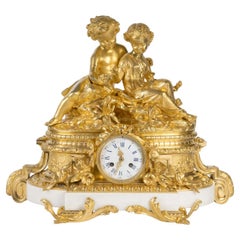 A Gilt and Chased Bronze Clock, a Marble Base, Napoleon III Period, 19th Century