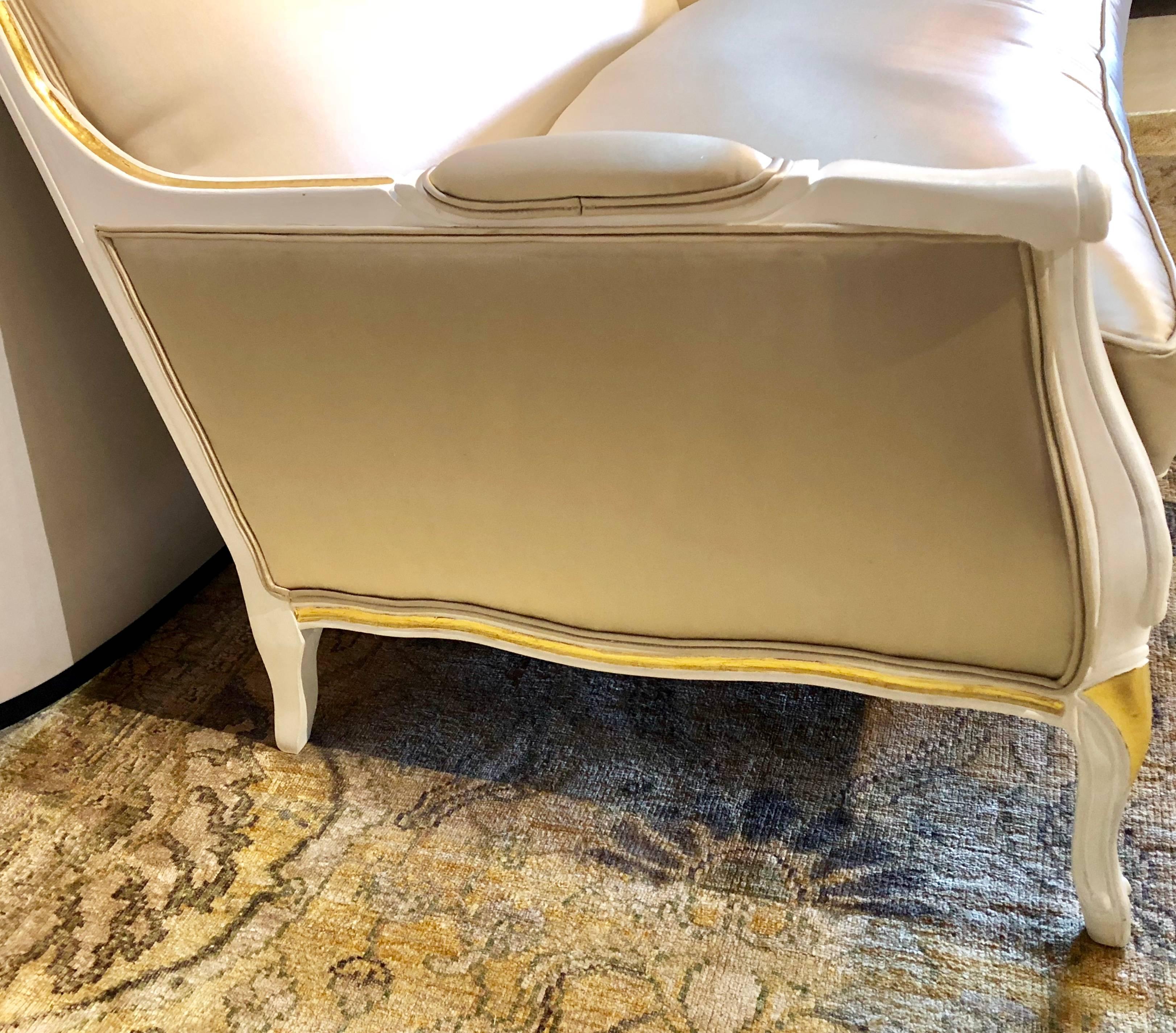 Gilt and Paint Decorated Settee / Loveseat in a Fine Satin Upholstery In Good Condition In Stamford, CT