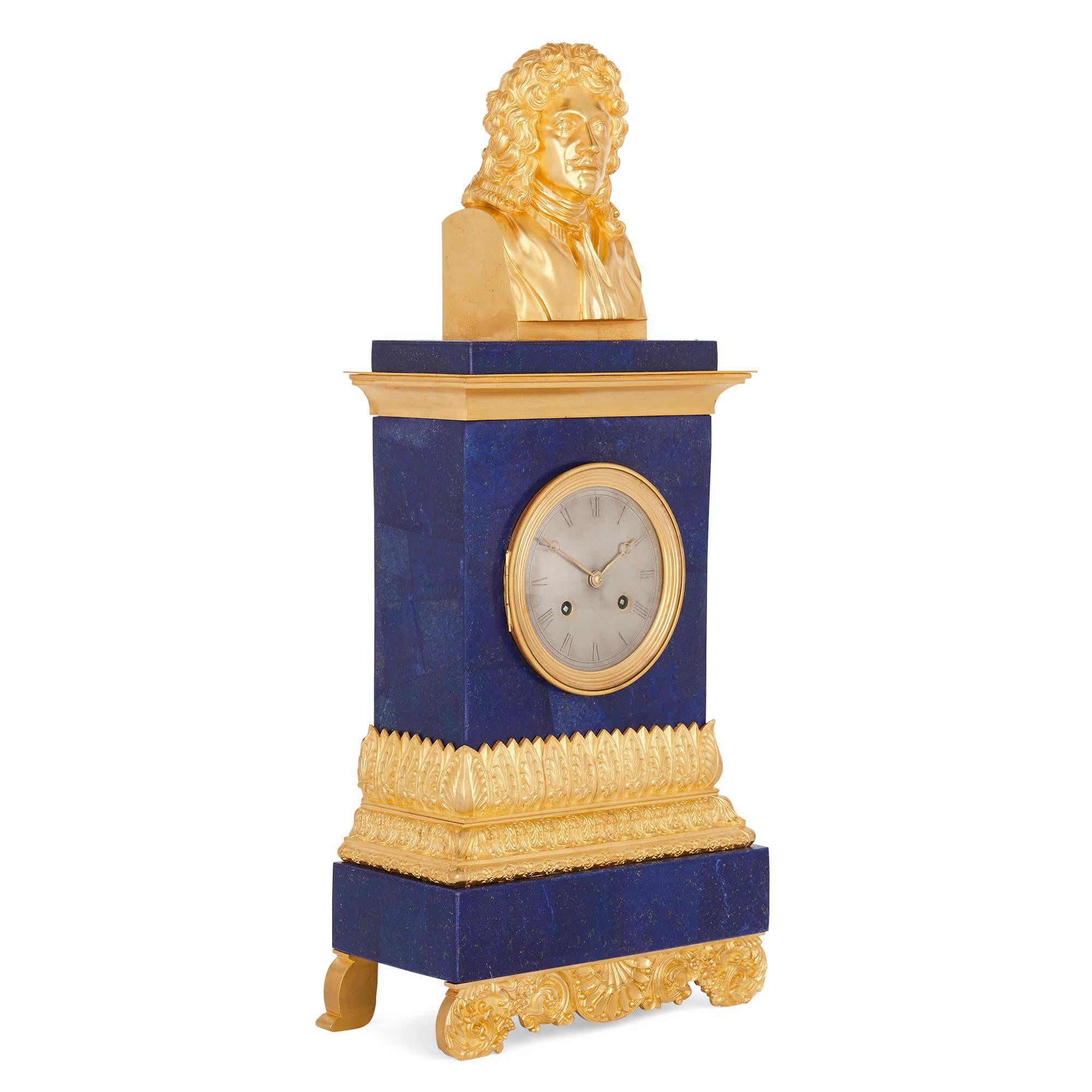 A gilt bronze and blue lapis lazuli clock with bust of Molière
French, circa 1830 
Measures: Height 61cm, width 27cm, depth 13cm

This exquisite French mantel clock originates from circa 1830, and more recently the piece has been veneered in