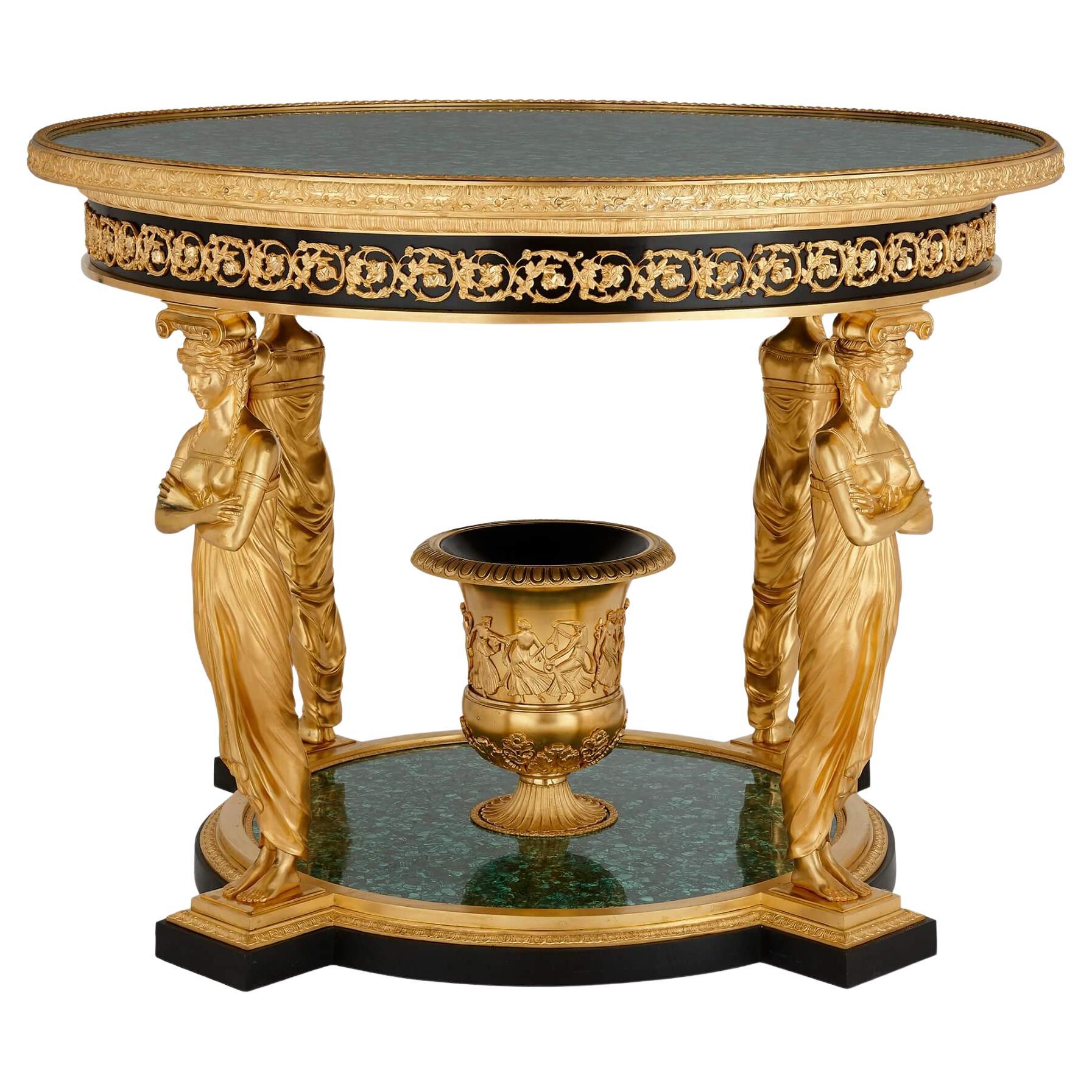 Tisch „Aux Caryatides“ aus vergoldeter Bronze und Malachit im Empire-Stil nach Desmalter im Angebot