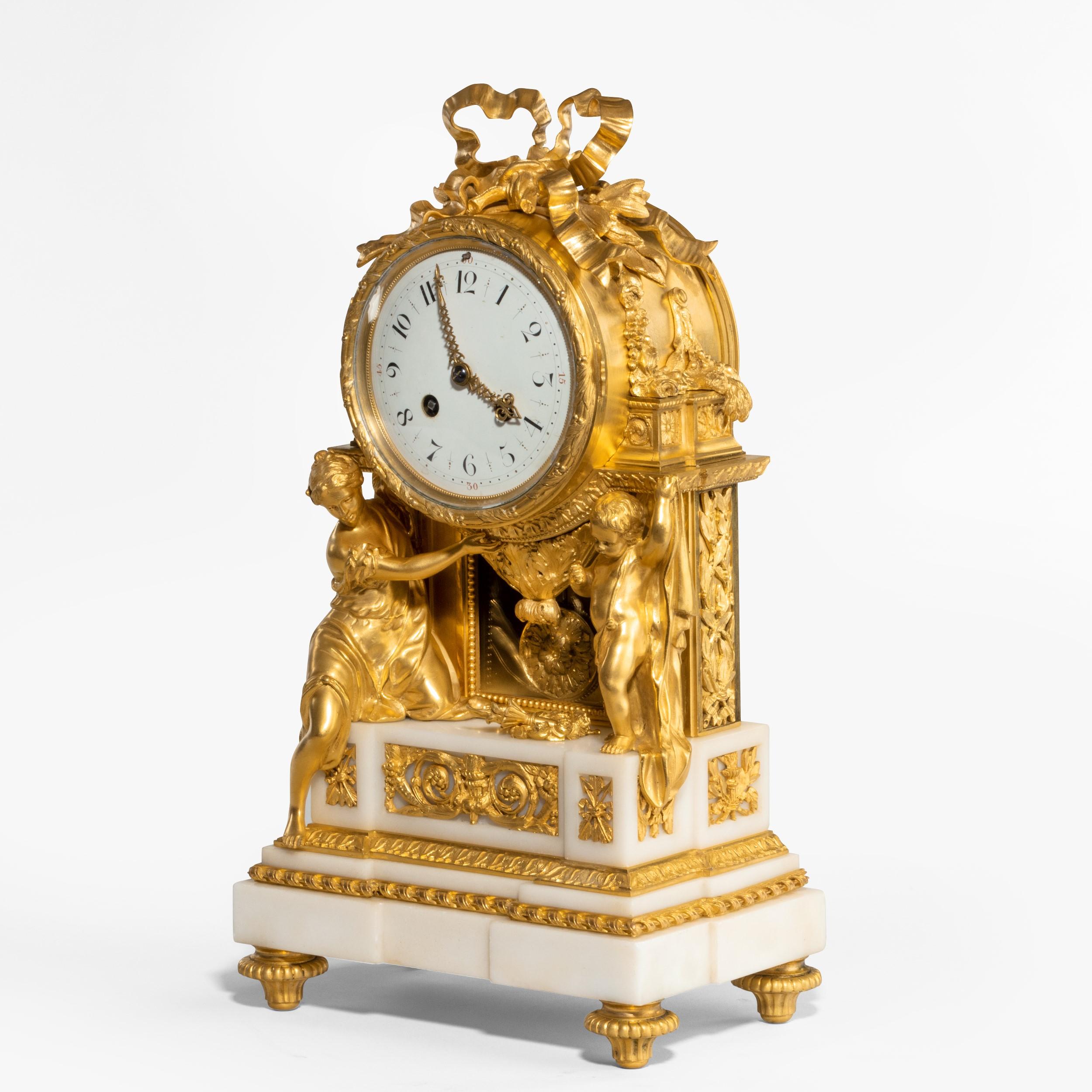 A Belle Époque mantle clock by Samuel Marti

Constructed in white Carrara marble and finely cast ormolu; four toupie feet support the inverted breakfront stepped marble plinth, dressed with stiff leaf running mounts, and surmounted with figures of