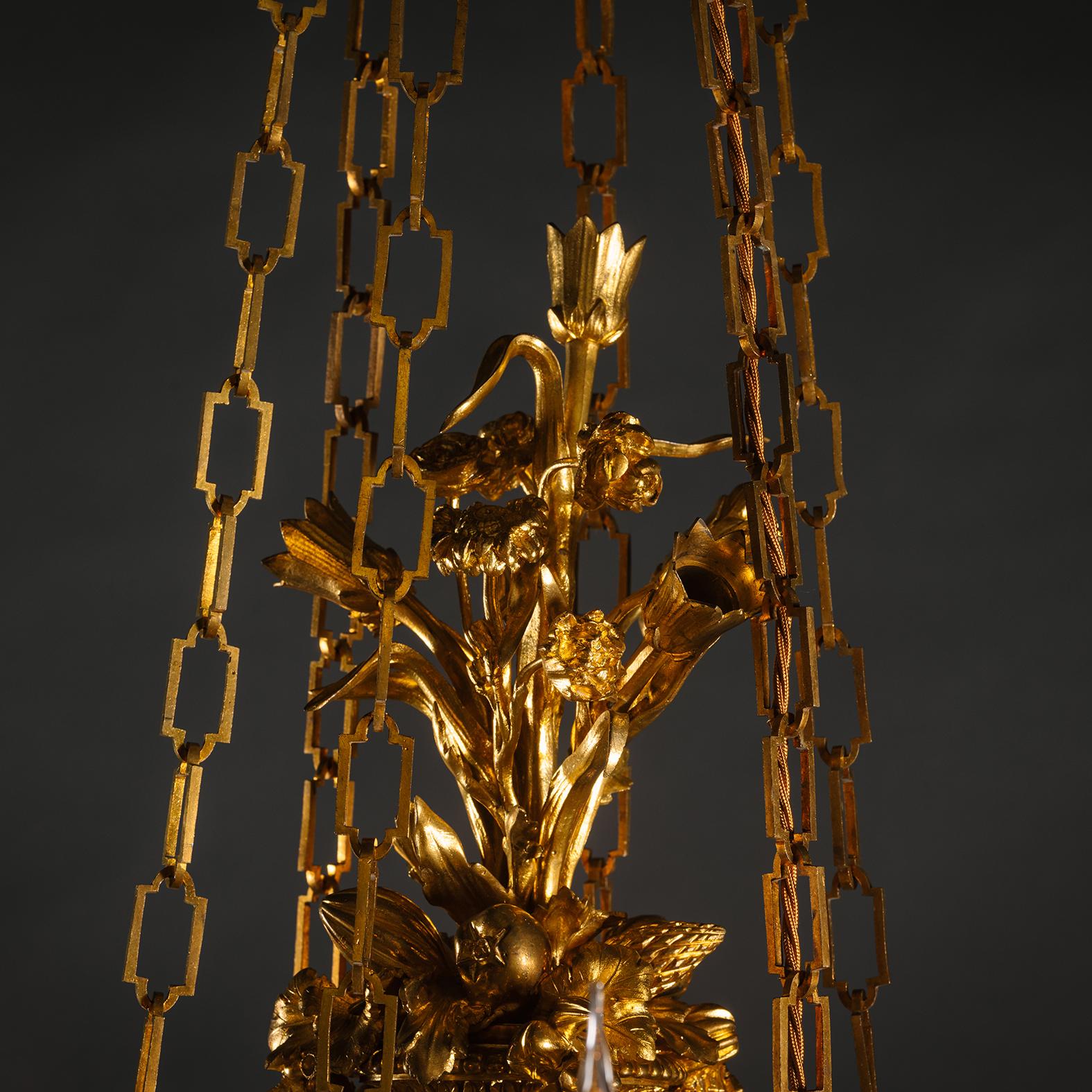A Gilt-Bronze and Tole Twelve-Light Chandelier, Attributed to Maison Beurdeley In Good Condition For Sale In Brighton, West Sussex