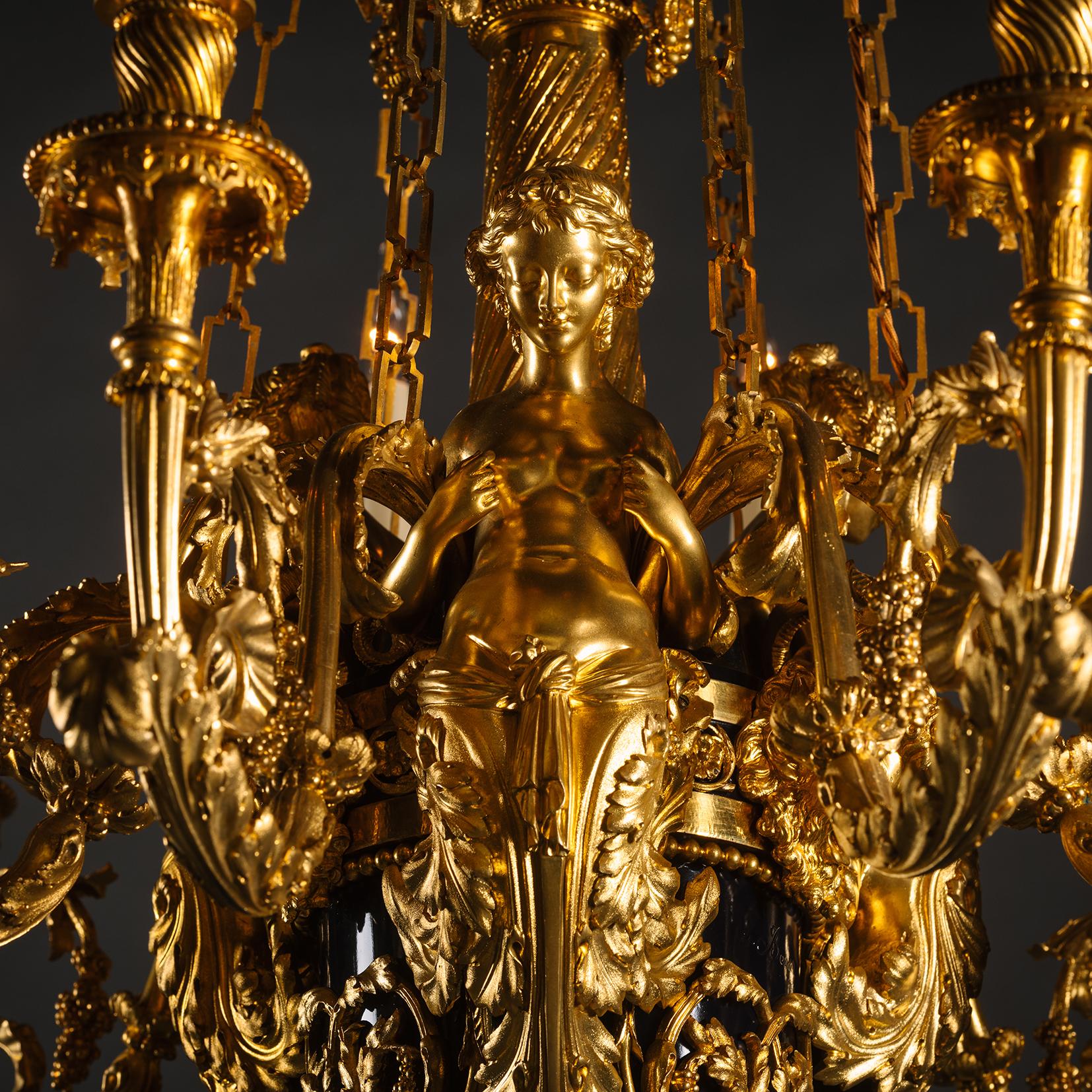 A Gilt-Bronze and Tole Twelve-Light Chandelier, Attributed to Maison Beurdeley For Sale 3