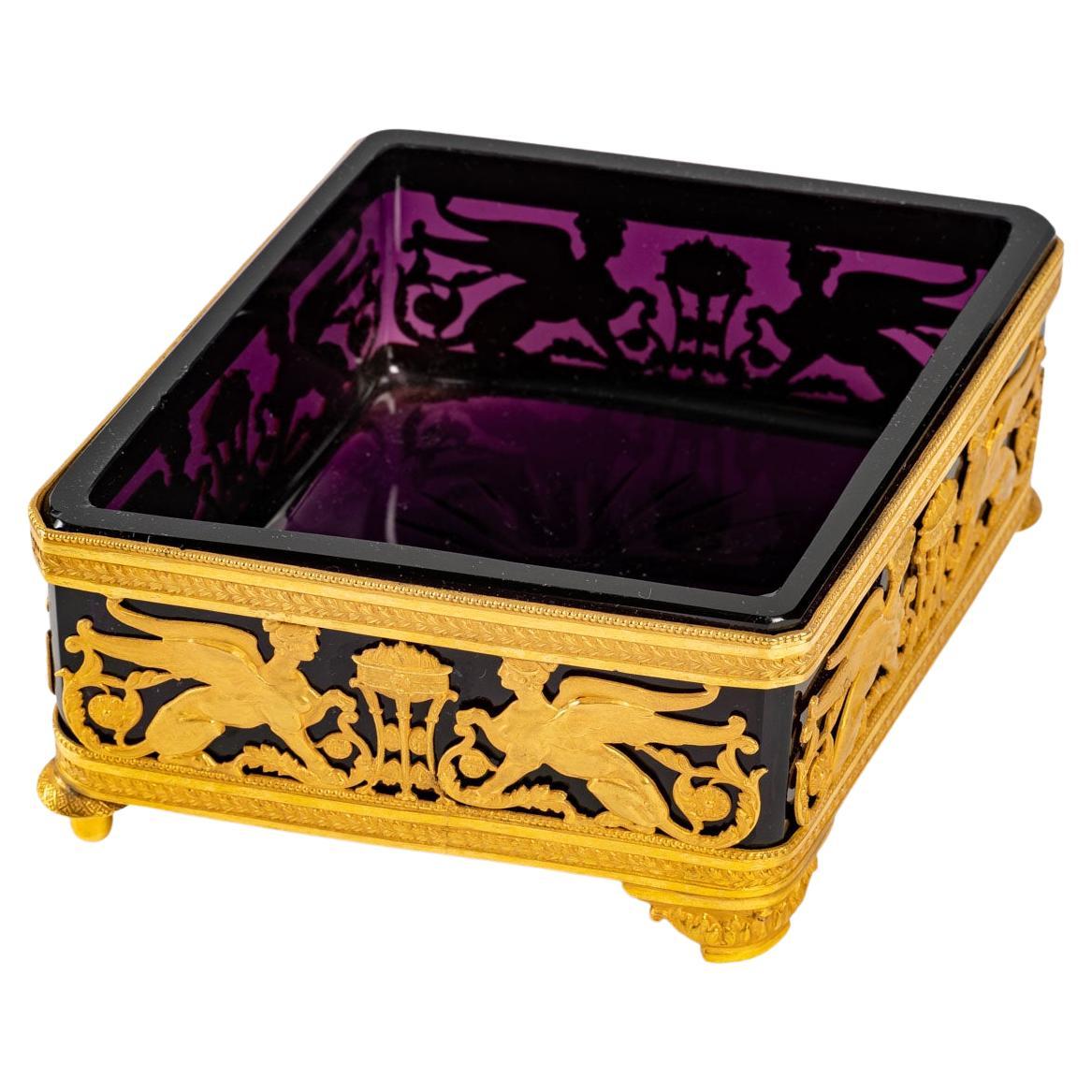 A gilt bronze and violet crystal square bowl, 19th century For Sale