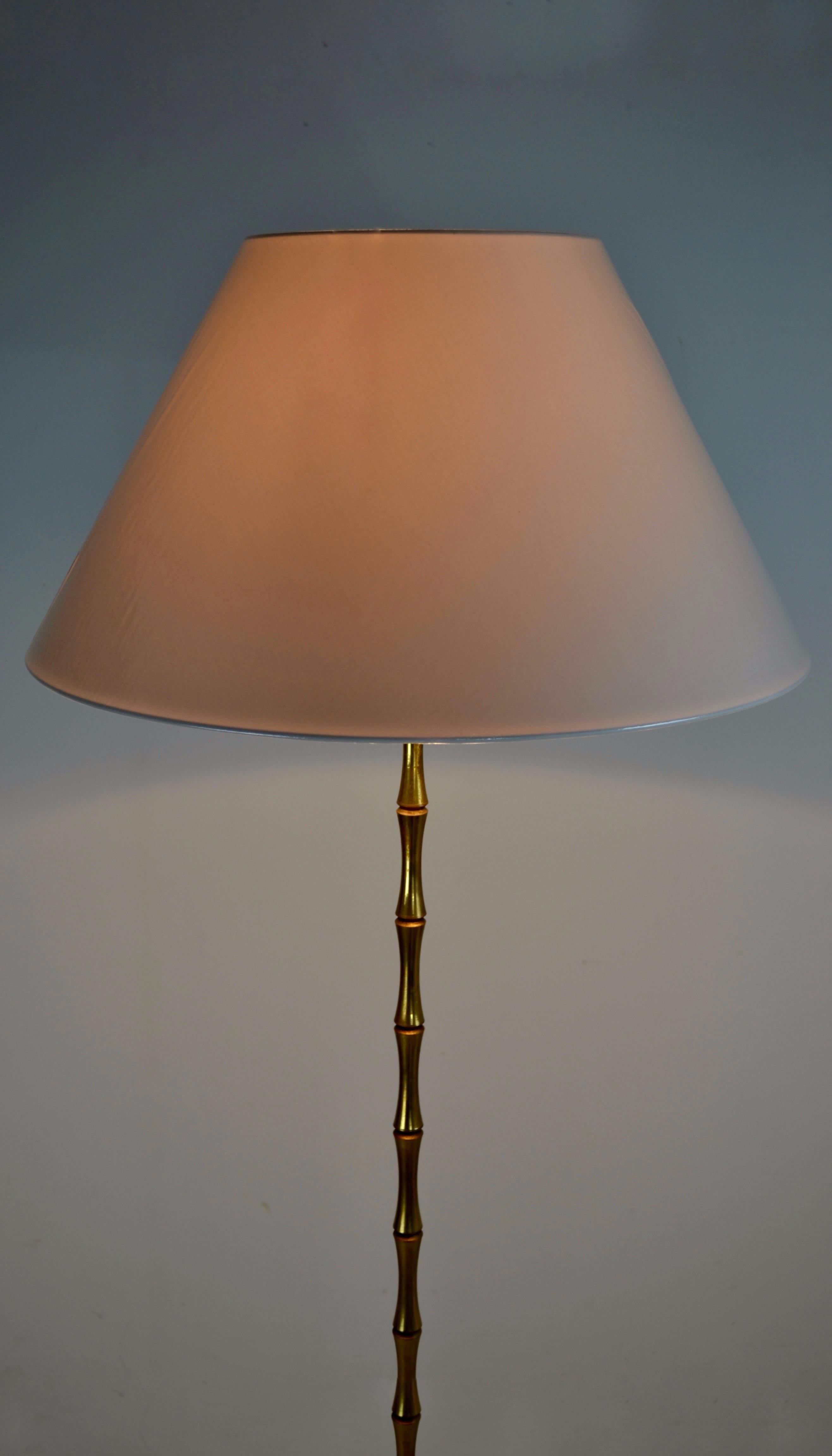 Mid-20th Century A gilt bronze floor lamp by Maison Bagues. France - 1950s For Sale