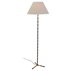A gilt bronze floor lamp by Maison Bagues. France - 1950s