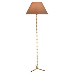 A gilt bronze floor lamp by Maison Bagues. France - 1950s
