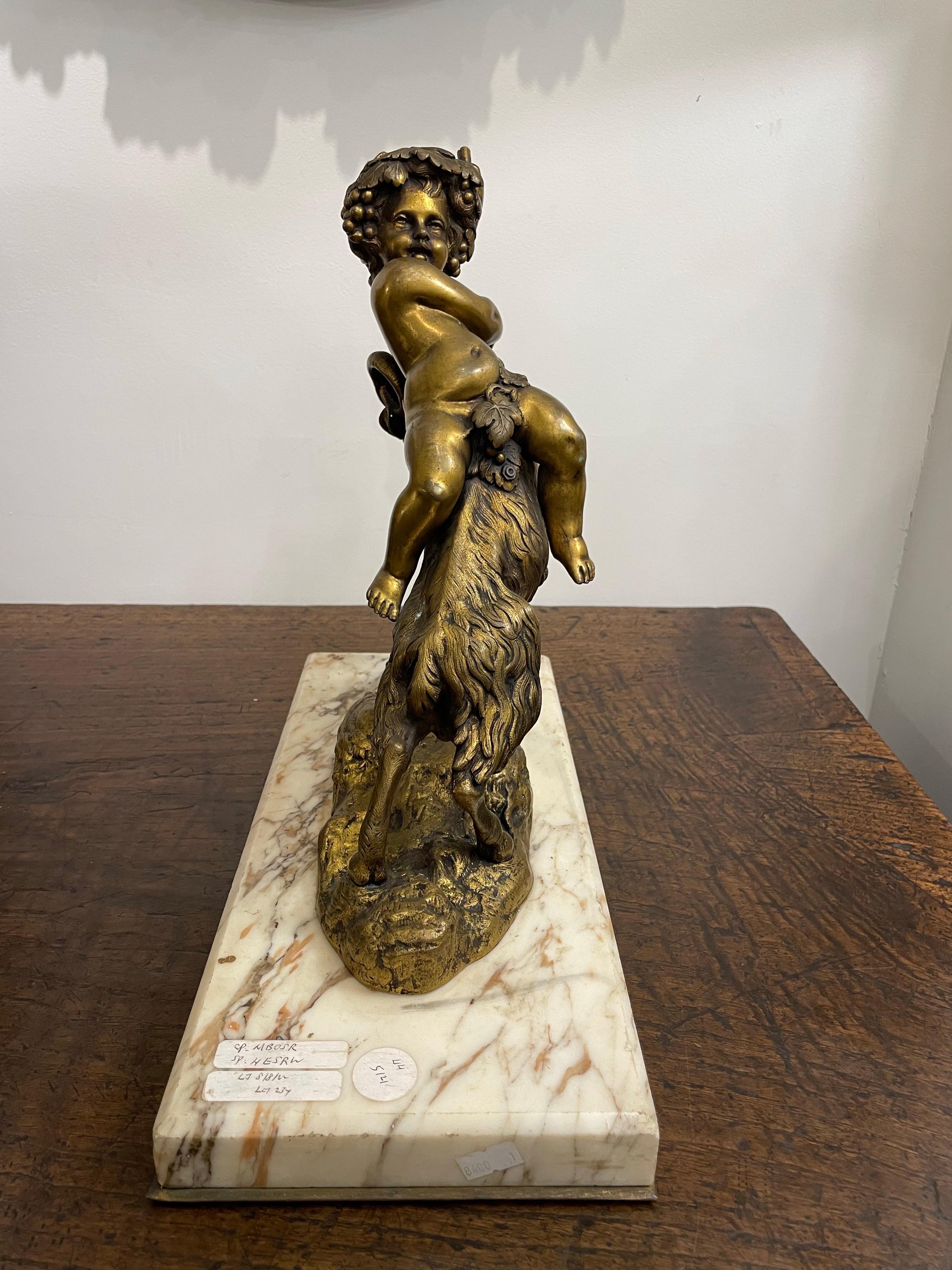 A Gilt-Bronze Group of the Infant Bacchus After Clodion, Late 19th Century For Sale 1