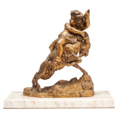 A Gilt-Bronze Group of the Infant Bacchus After Clodion, Late 19th Century