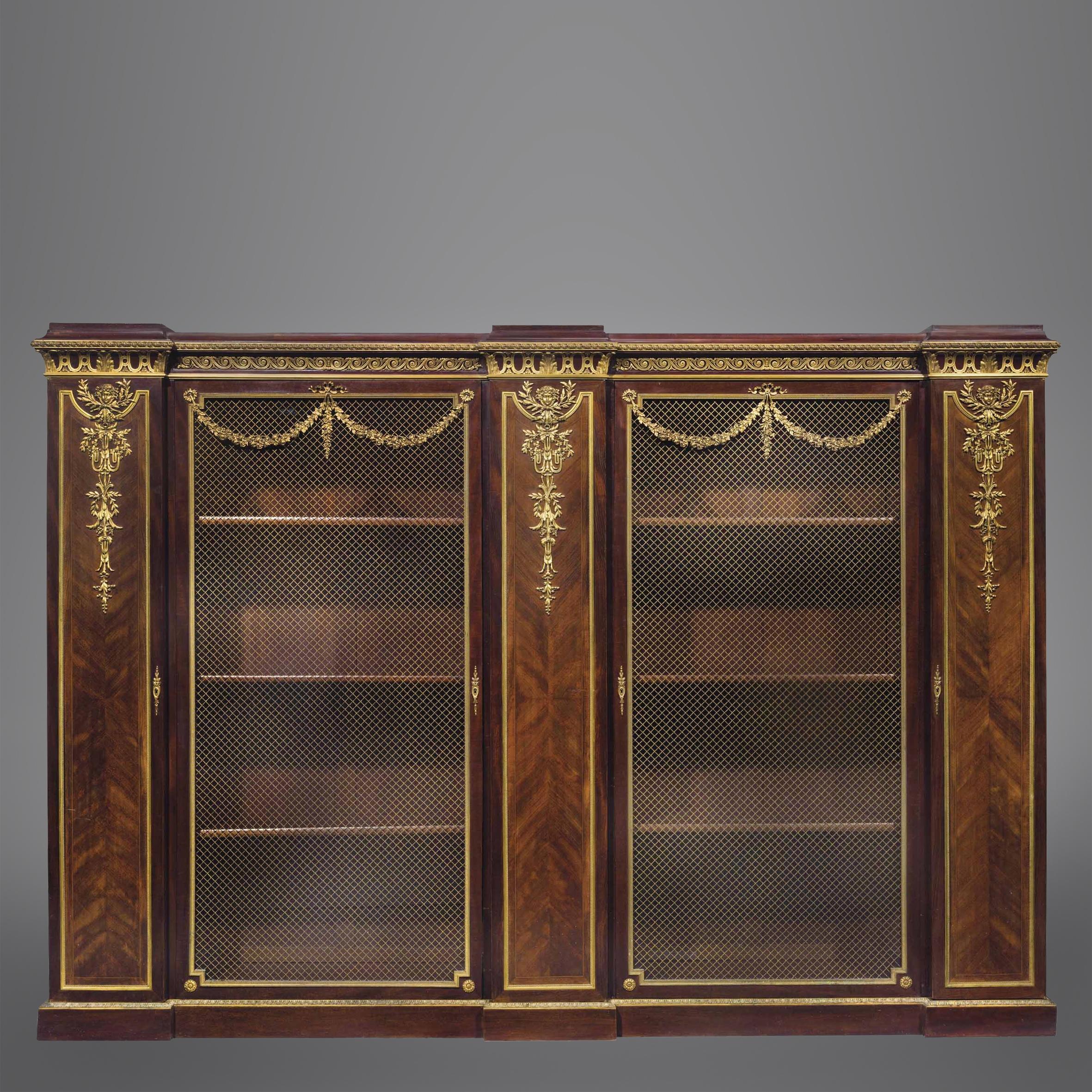 Louis XVI Gilt-Bronze Mounted Mahogany and Satine Bookcase by François Linke, circa 1890 For Sale