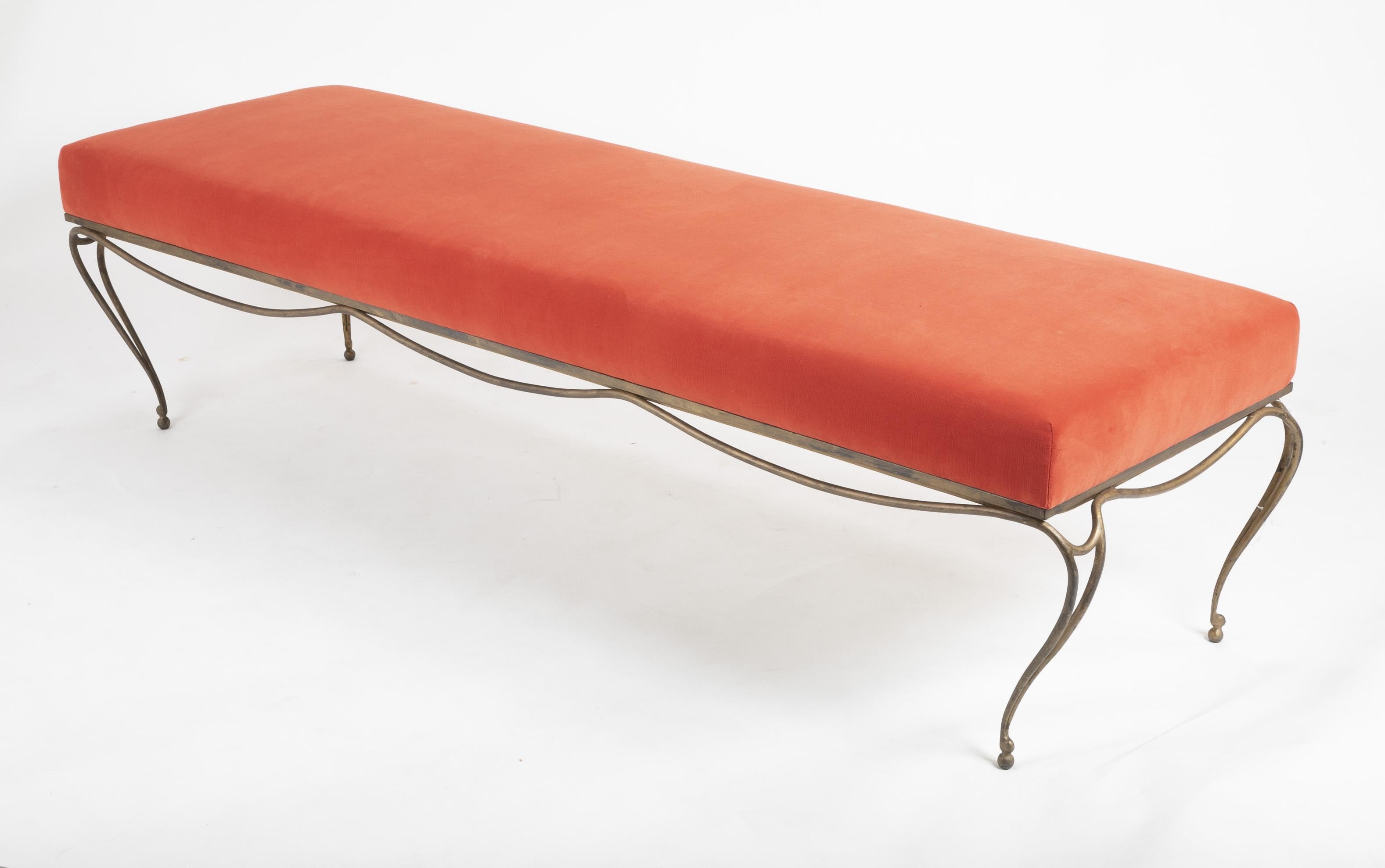 A French velvet and gilt steel bench in the style of Jean Royère.