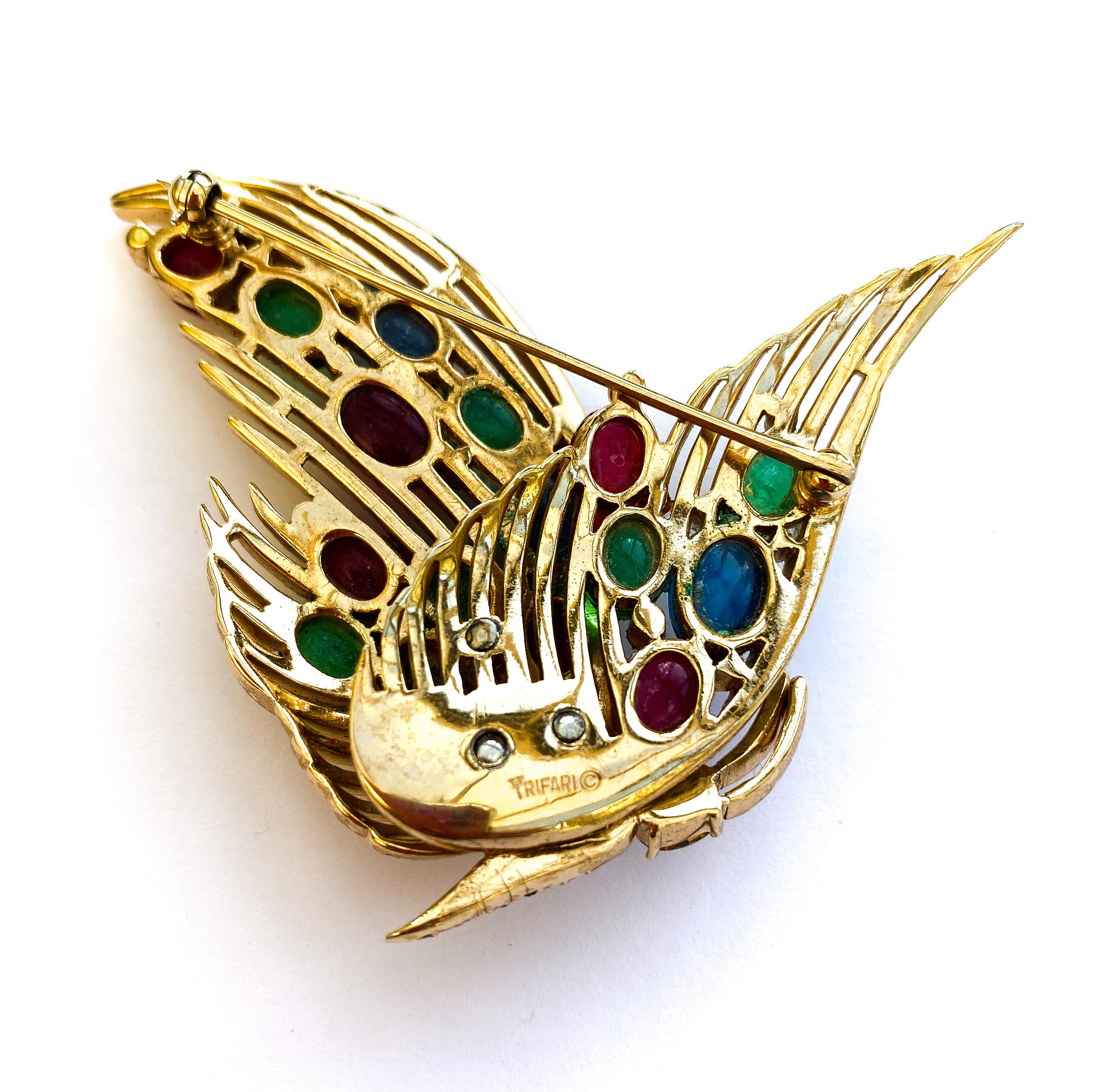 Women's or Men's A gilt metal and glass cabuchon Moghul style 'butterfly' brooch, Trifari, 1950s. For Sale