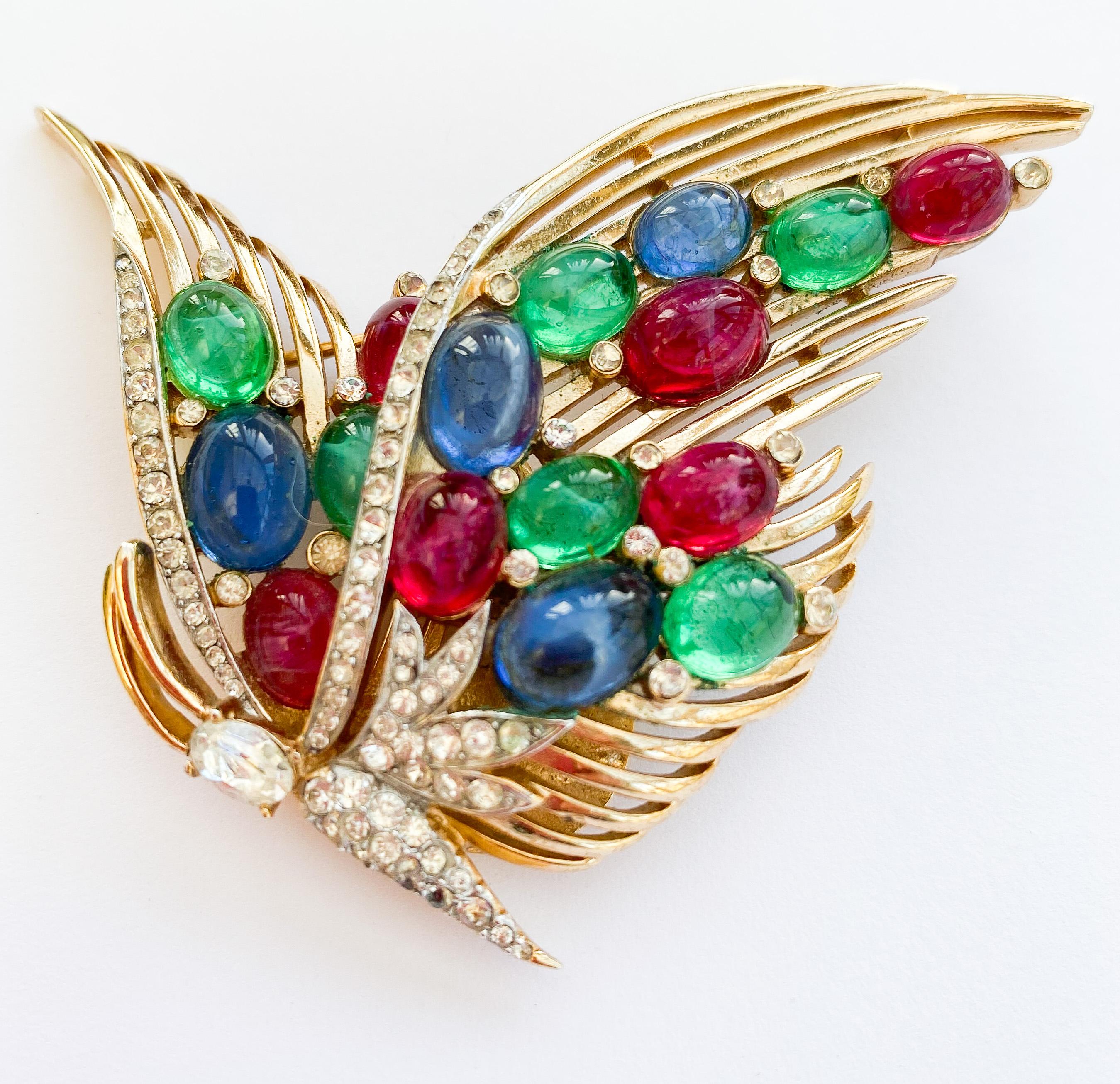 A gilt metal and glass cabuchon Moghul style 'butterfly' brooch, Trifari, 1950s. For Sale 3
