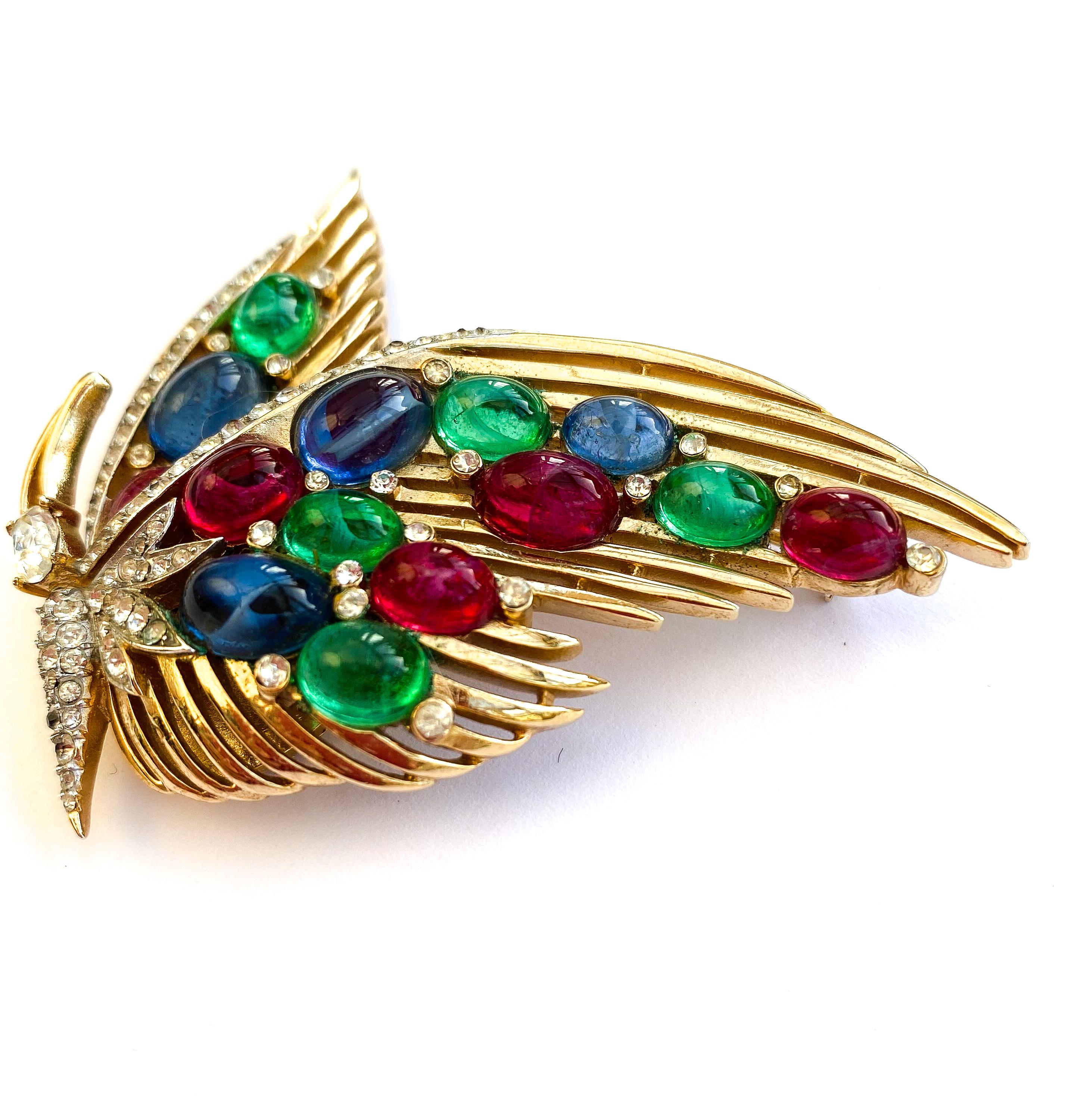 A gilt metal and glass cabuchon Moghul style 'butterfly' brooch, Trifari, 1950s. For Sale 4
