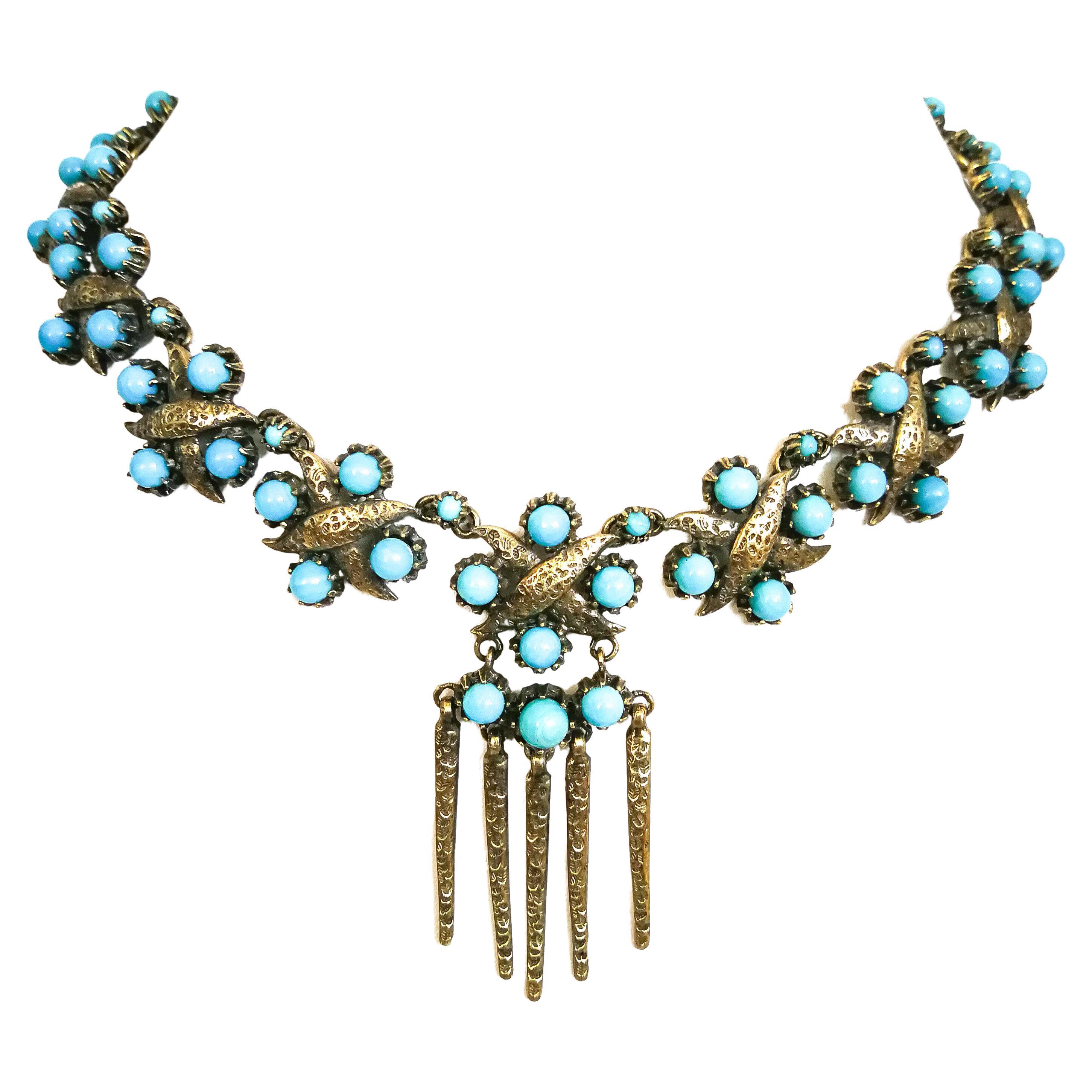 A gilt metal and turquoise glass bead sautoir necklace, Christian Dior, 1950s. For Sale