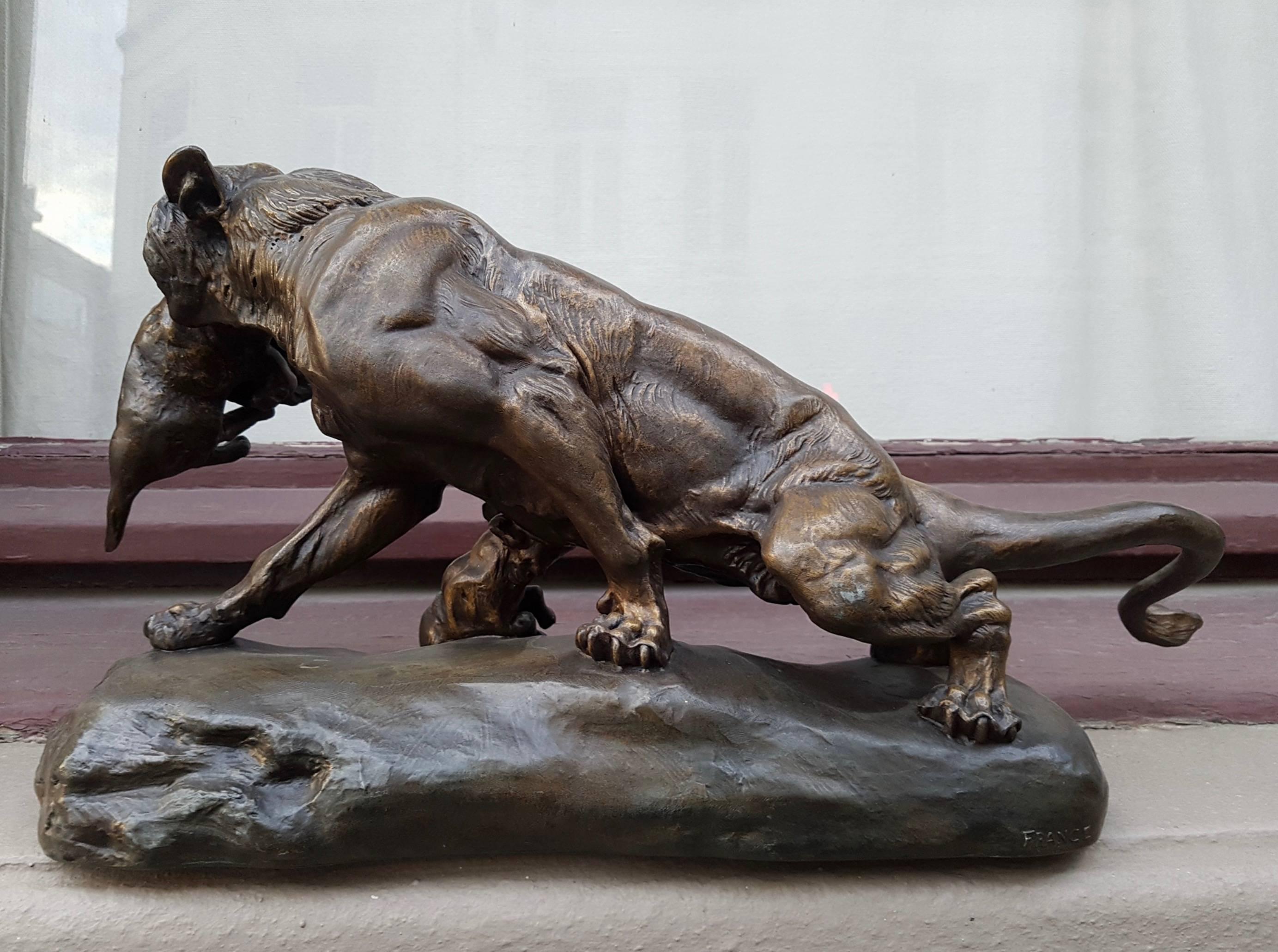 A Gilt Spelter Lioness with her Cubs, Signed Thomas Cartier 1