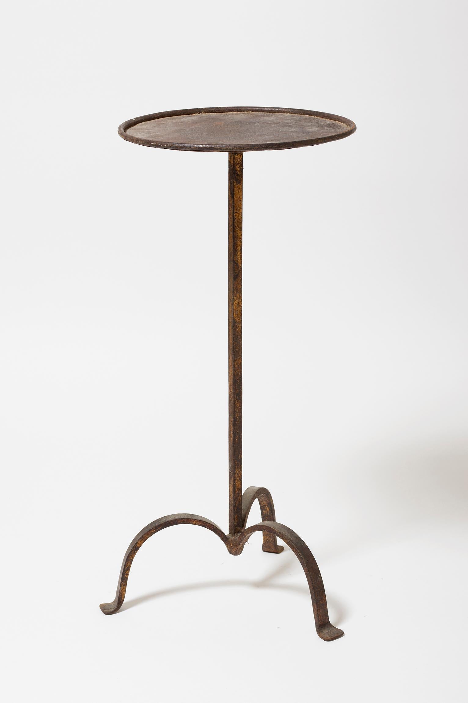 A gilt wrought iron martini table
Spain, circa 1950.