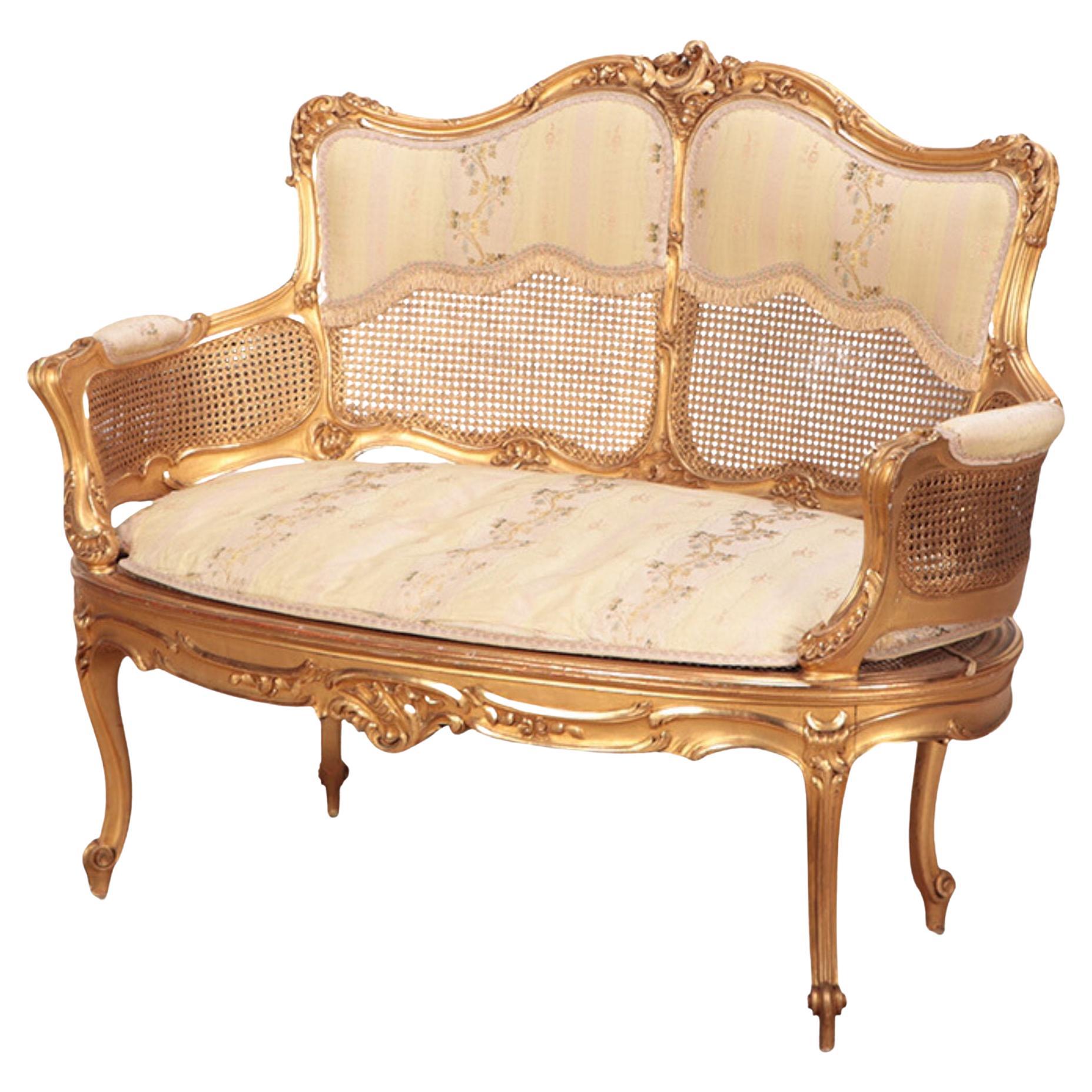 Canapé en bois doré et sculpté de style Louis XV, vers 1900 en vente