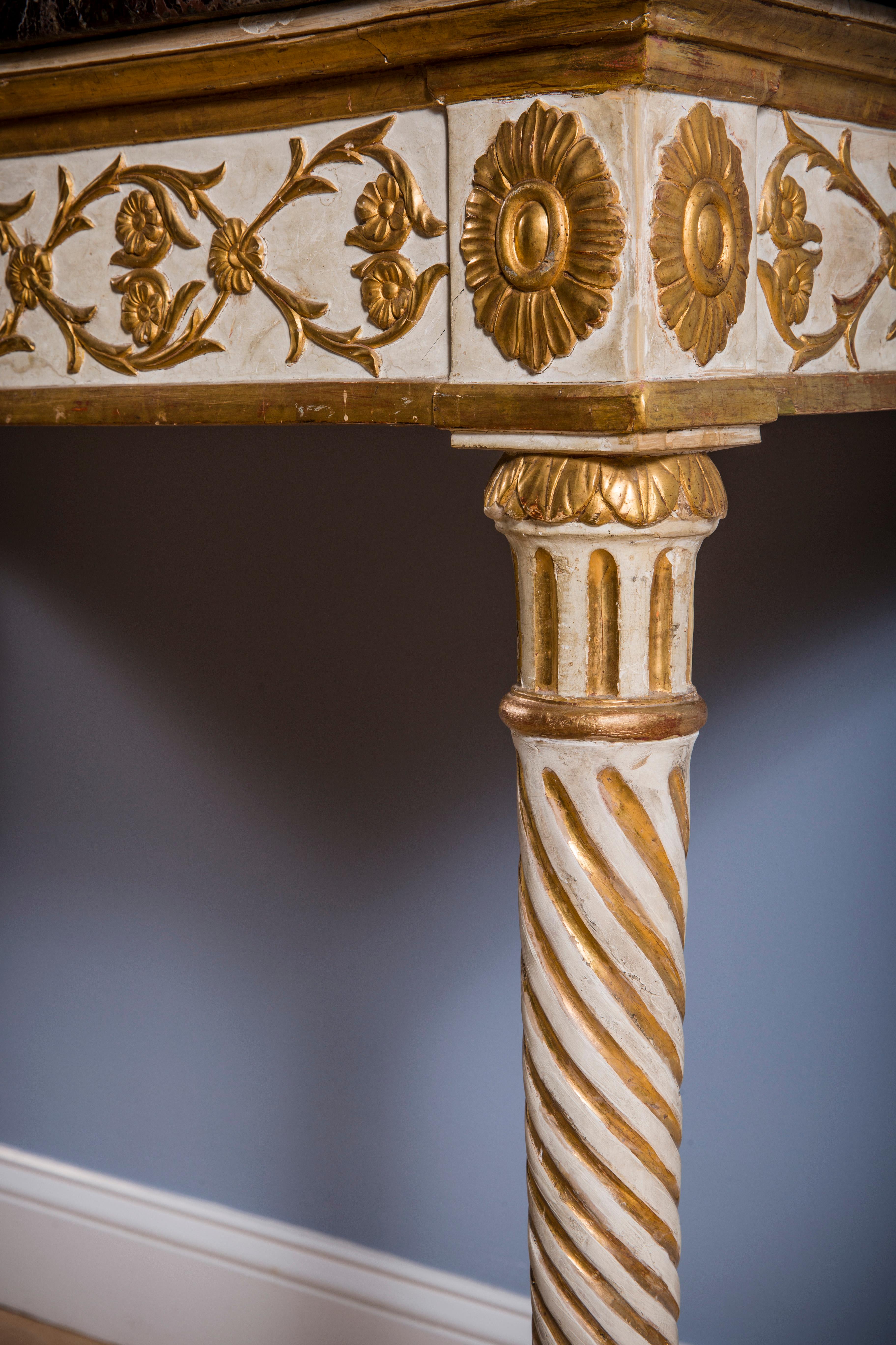 A Louis XVI console table with mirror
carved lacquer and giltwood with Verde Antico marble top
Italian, c. 1780 
Measures: H 36 in.; W 53 in.; D 26.5 in. Mirror: H 82 in.; W 48.5 in.

INV: 2819.