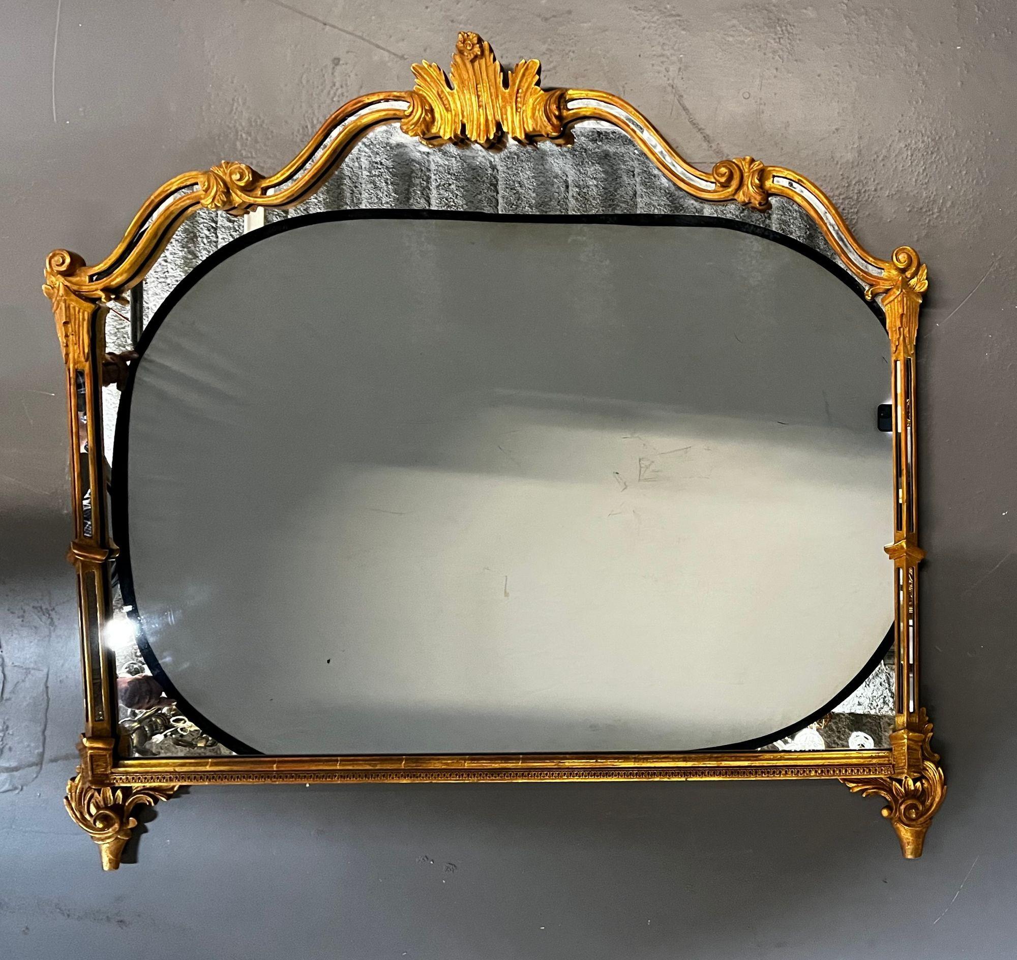 A Giltwood Over the Mantel, Console or Wall Mirror
 
The beautiful and subtle design of this giltwood mirror makes it versatile for use in almost any room of the home or office.  Set this stunning piece atop a commode or sideboard, dresser or