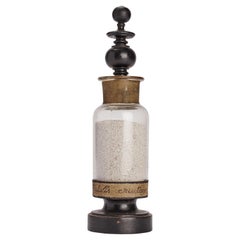 Ampolla di vetro con Pulvis eructanea, Francia 1870.