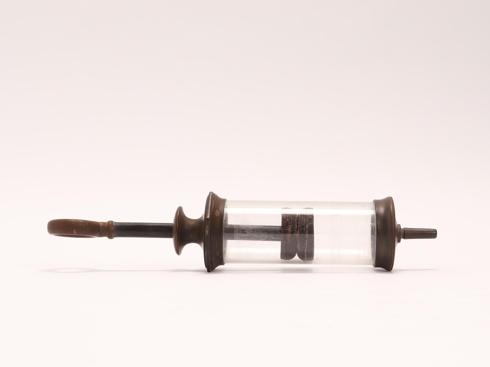 British A glass and vulcanite syringe, London 1880.  For Sale
