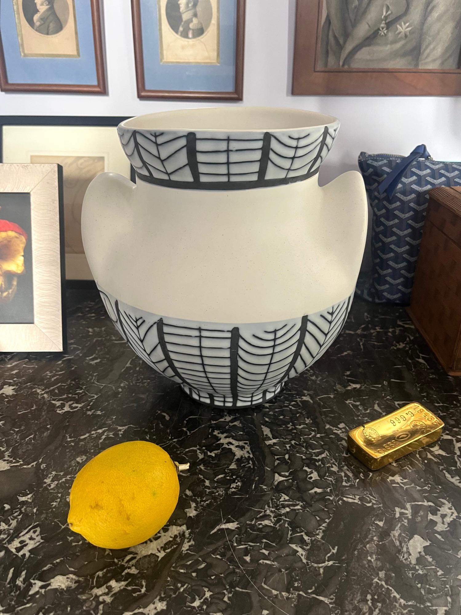 A glazed ceramic vase 