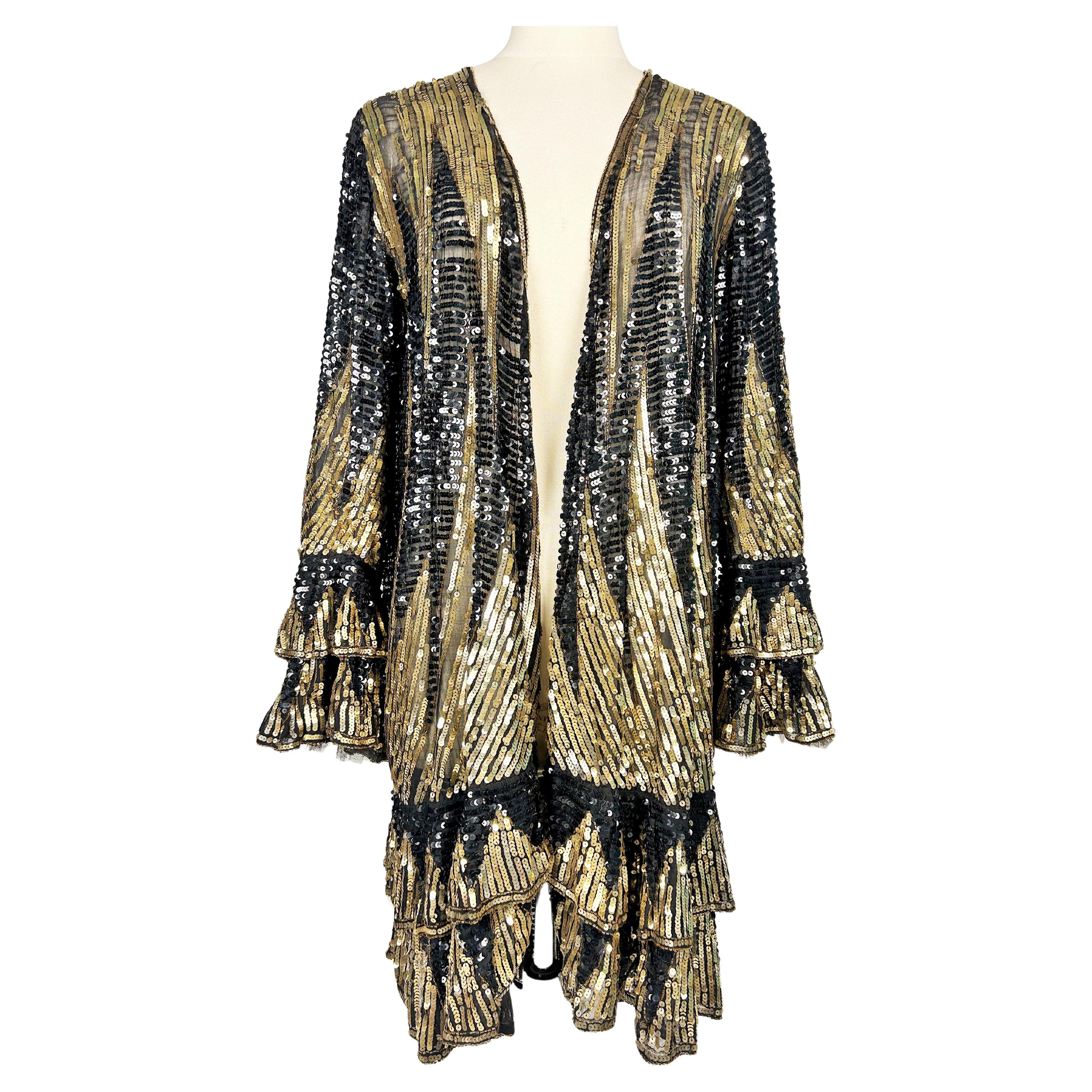 Uno scintillante cappotto da sera Art Déco ricamato con paillettes nere e oro - Fra