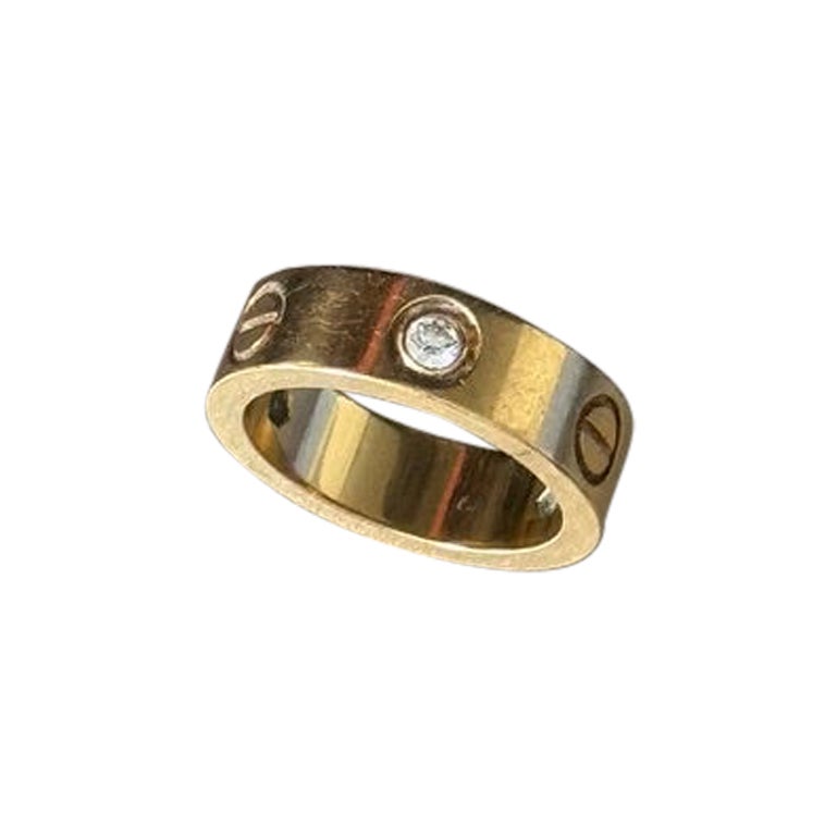 Bague "Love" en or et diamants, par Cartier en vente