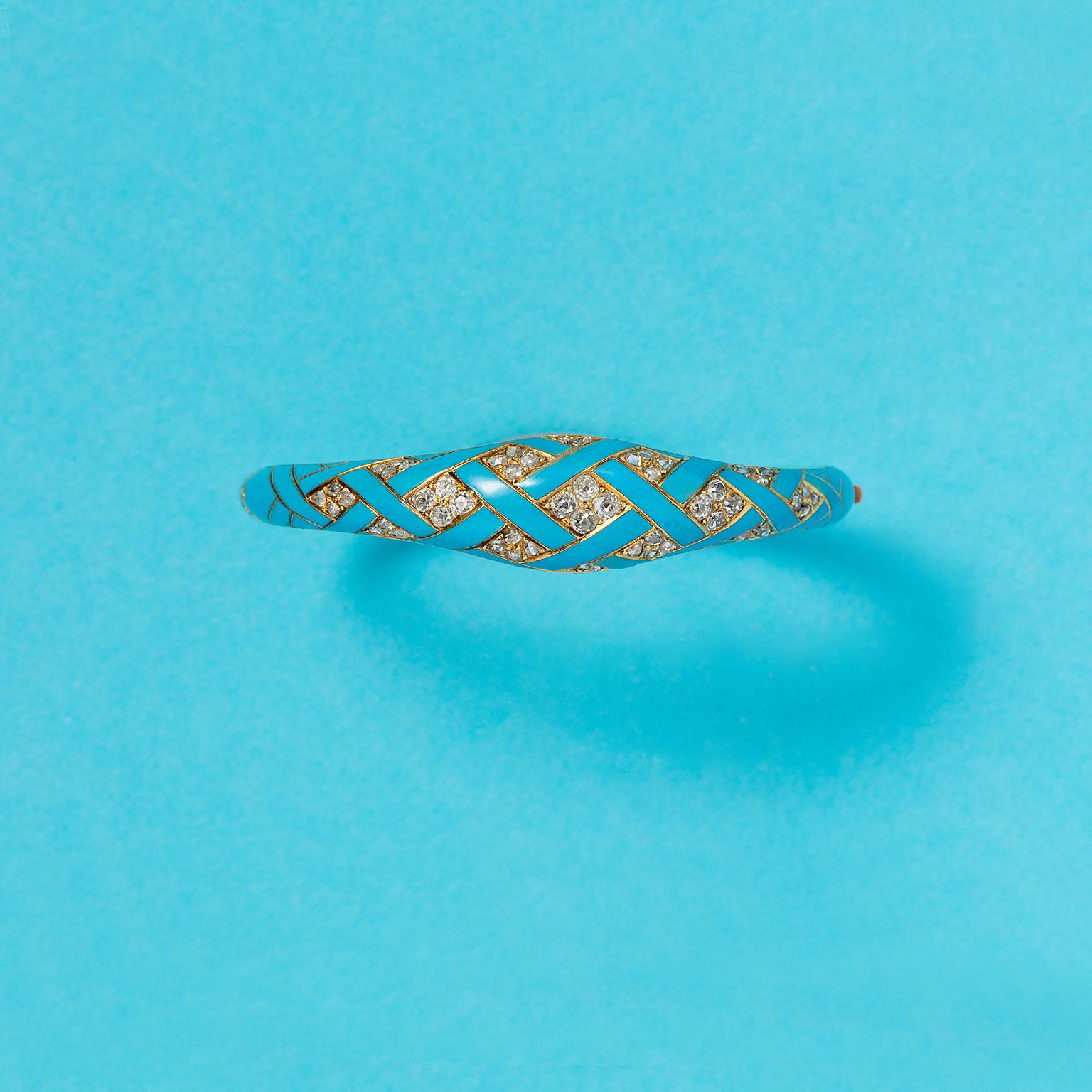 A Victorian 18 carat gold bracelet with turquoise enamel and rose cut and old cut diamonds (circa 0.8 carat), end 19th century, most likely English in origin. 

weight: 23 grams 
Circumference: 17.5 cm fits a small to medium size wrist 
