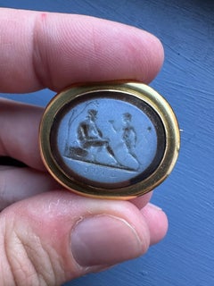 A Gold Brooch set with a Late 18th c. Nicolo Intaglio — Youth and Satyr