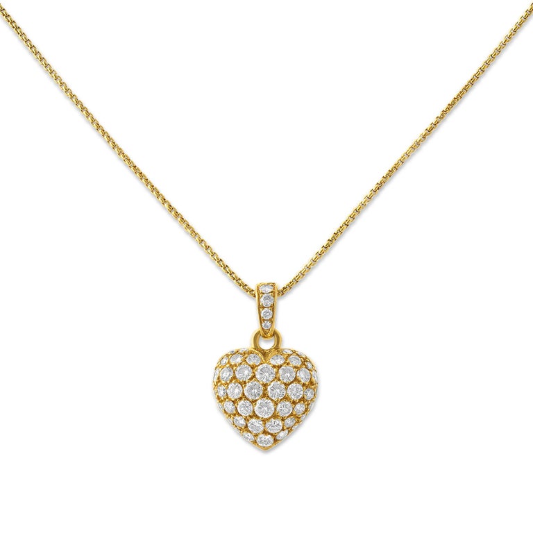 Cartier Pendentif cœur en or et diamants En vente sur 1stDibs