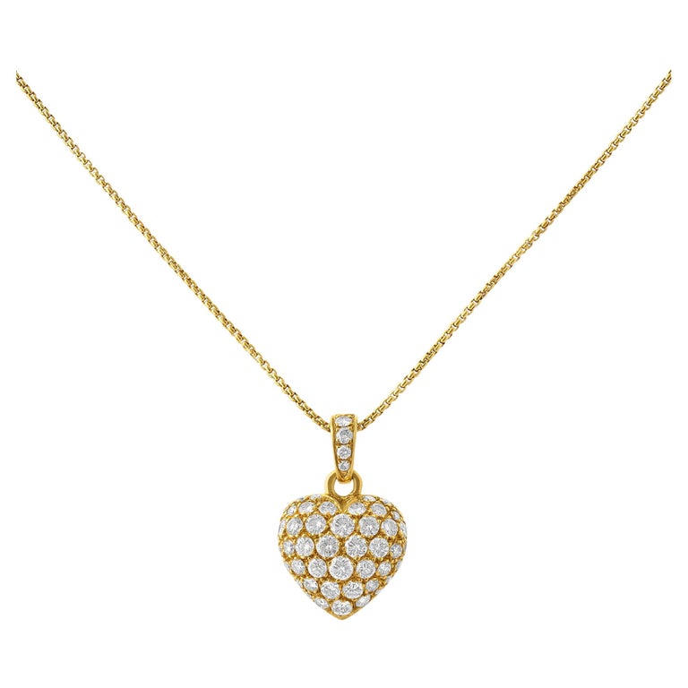Cartier Pendentif cœur en or et diamants En vente sur 1stDibs