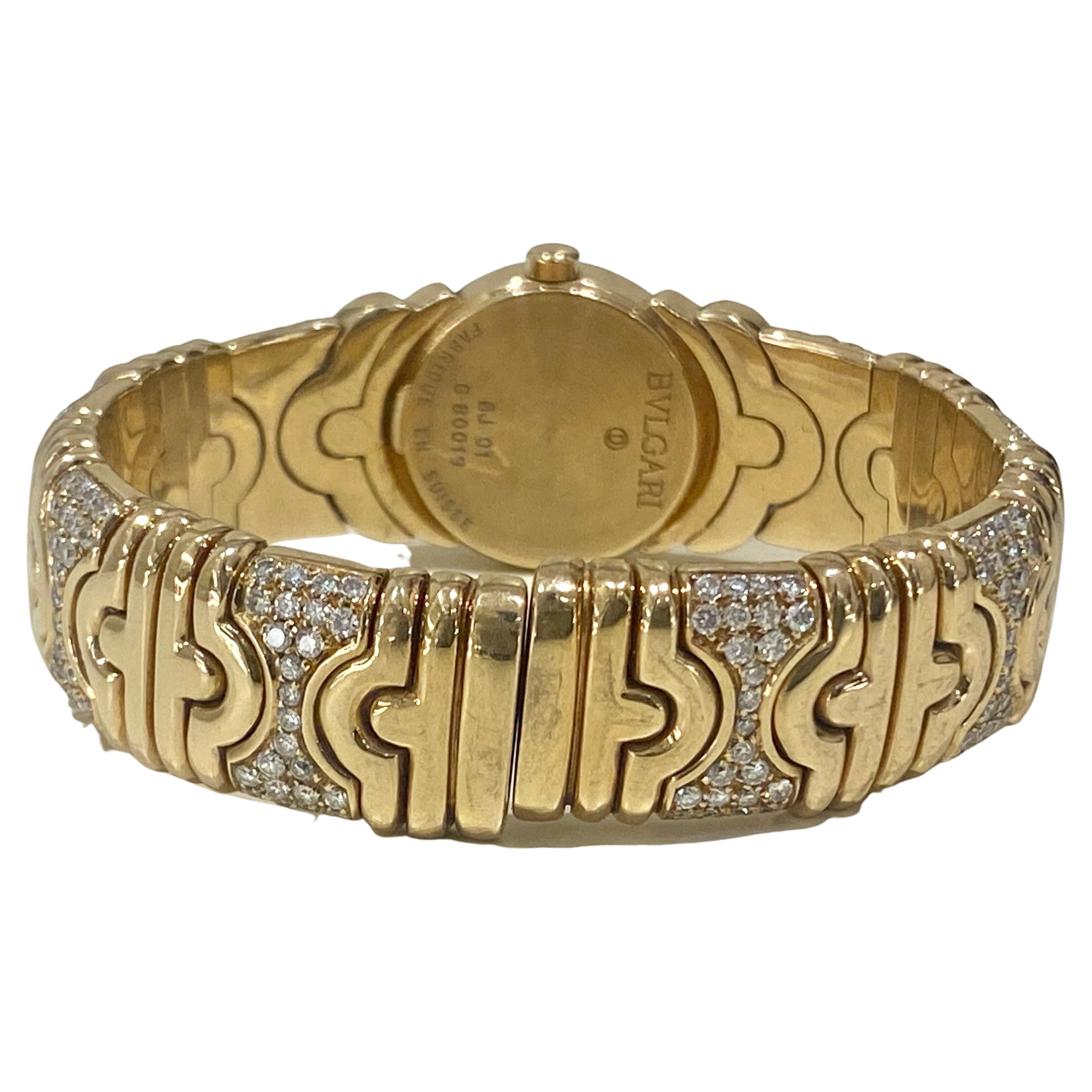 A Gold & Diamond Parentesi watch bracelet & Cuff Bracelet Set by Bulgari 9