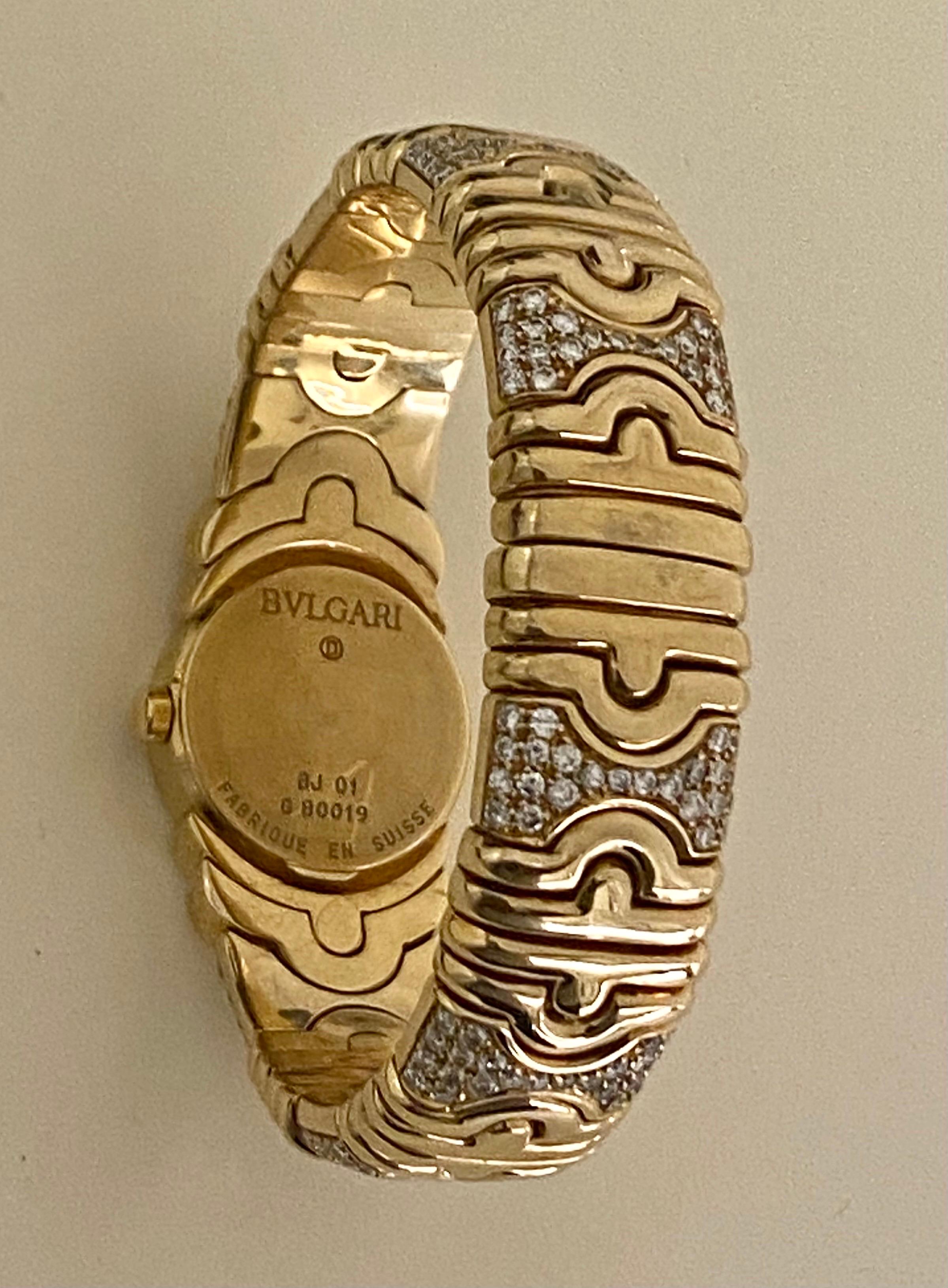 A Gold & Diamond Parentesi watch bracelet & Cuff Bracelet Set by Bulgari 13