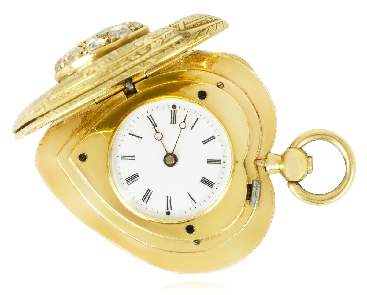 A Gold Emerald & Diamond Heart Shape Keywind Cylinder Full Hunter Pendant Watch C1840

Dial: The super white enamel dial with Roman numerals outer minute track with fine original blue steel Breguet moon hands. The dial is surrounded with a heart