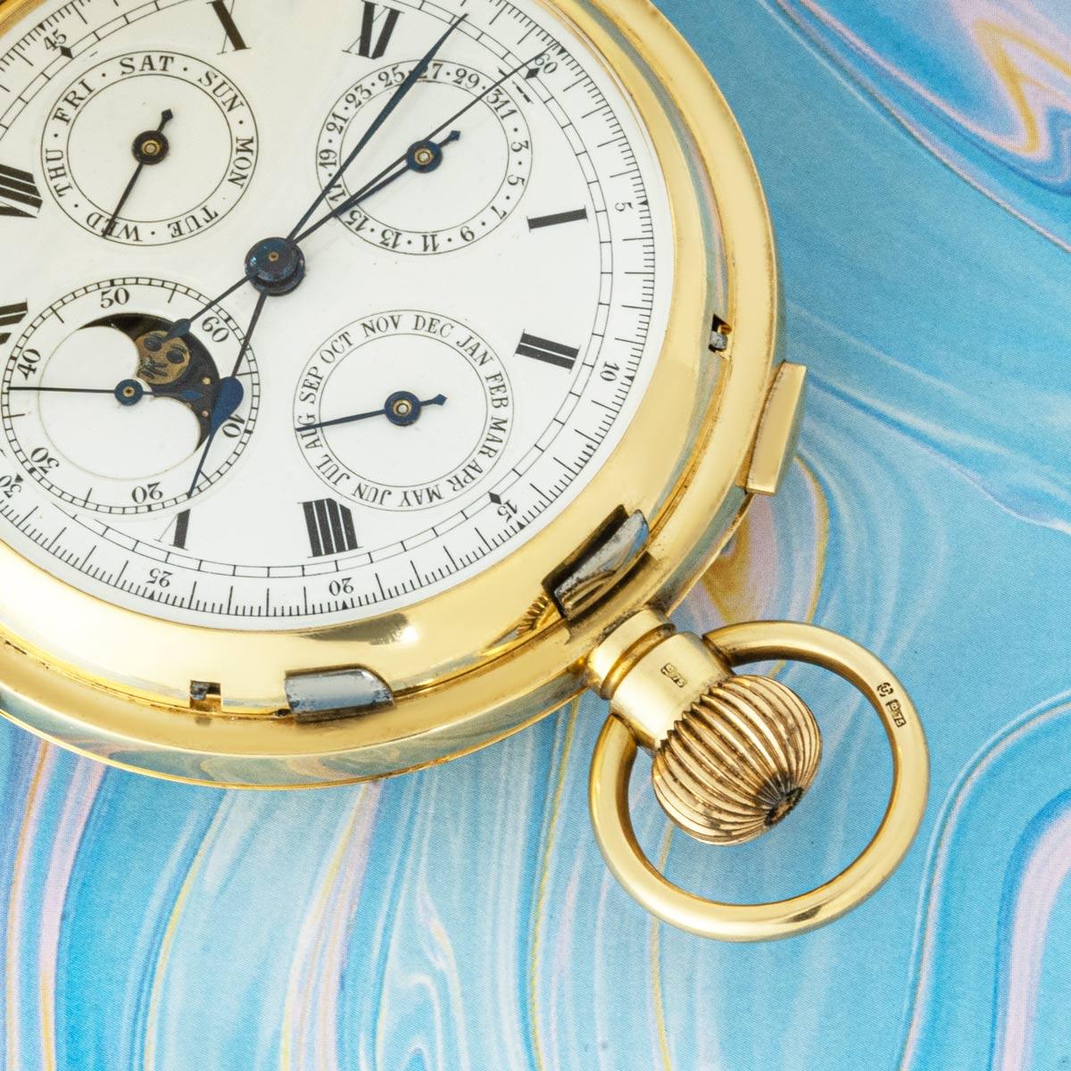 An 18k Yellow Gold Full Hunter Chronograph Calendar Quarter Repeater Keyless Lever Pocket Watch, C1900's.

Dial: A white enamel dial with roman numerals and outer tachymeter minute track, with the date sub dial at twelve o'clock, the day and month
