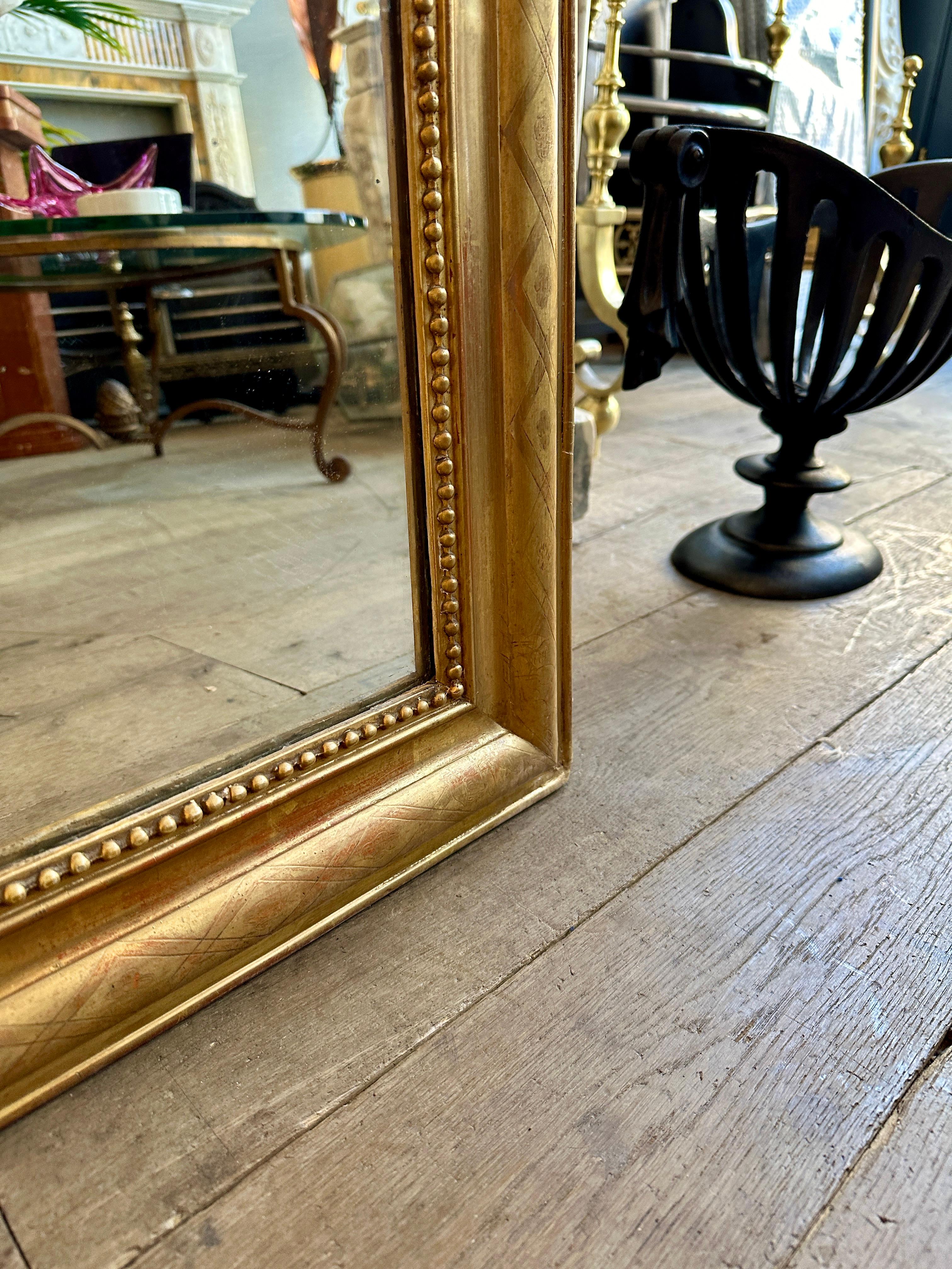 XIXe siècle Miroir Antique Louis Philippe en or et doré