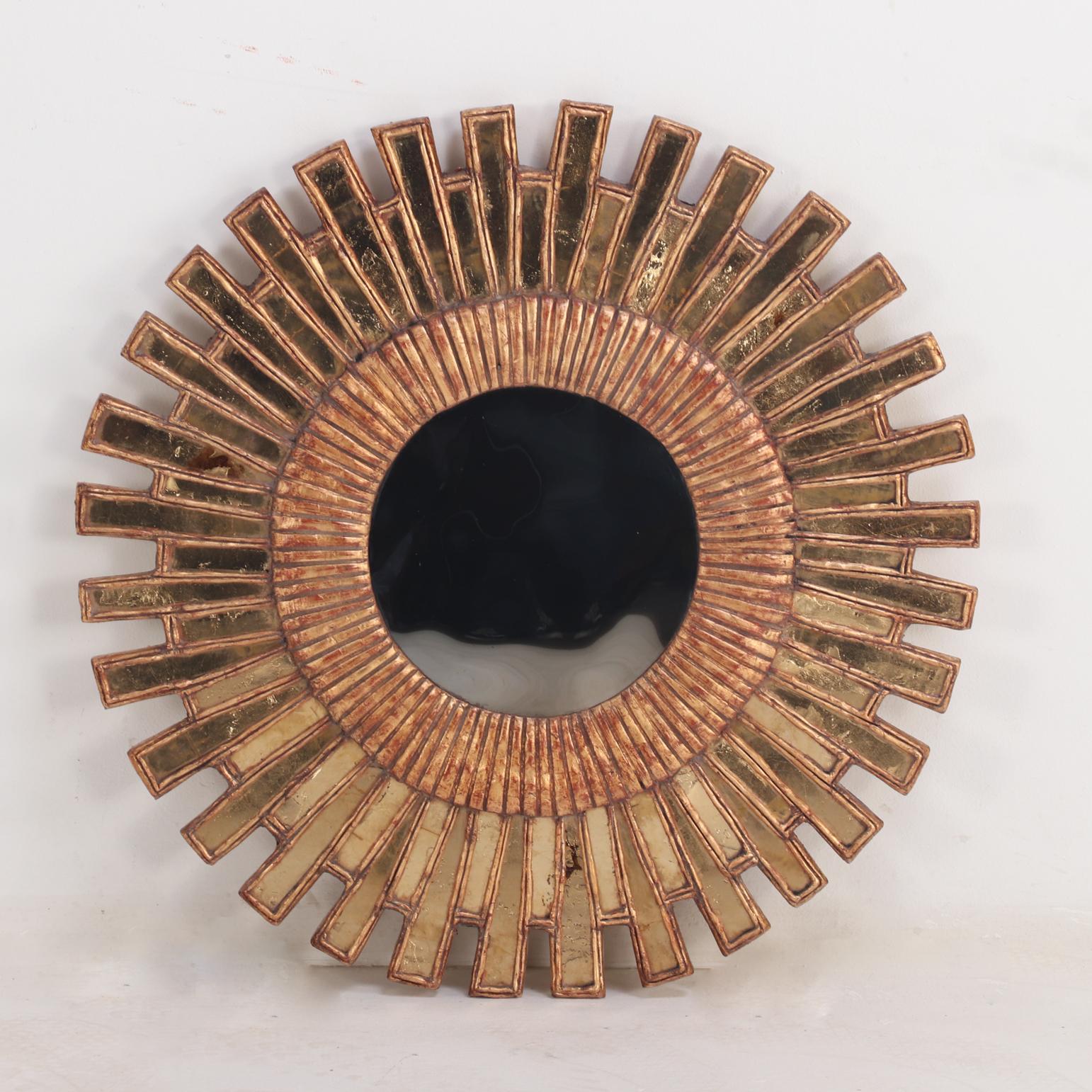 A Gold Glass and Resin Sunburst Mirror. For Sale 1