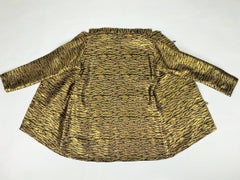 A Gold lamé and taffeta printed Modernist evening jacket -France Circa 1970-1980