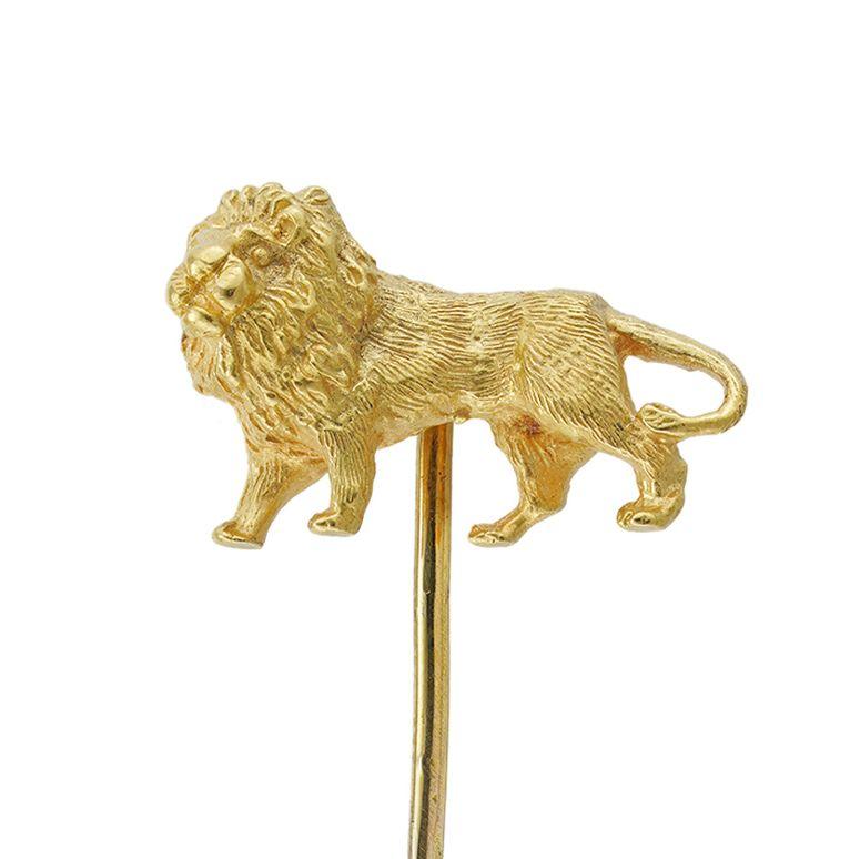 A gold lion stick-pin, the realistically carved lion made in yellow gold, with gold pin fitting, the jewelled part measuring 1.7 x 1cm, gross weight 4.9grams.

This antique stick-pin is in excellent condition for its age. Unmarked, the lion tested